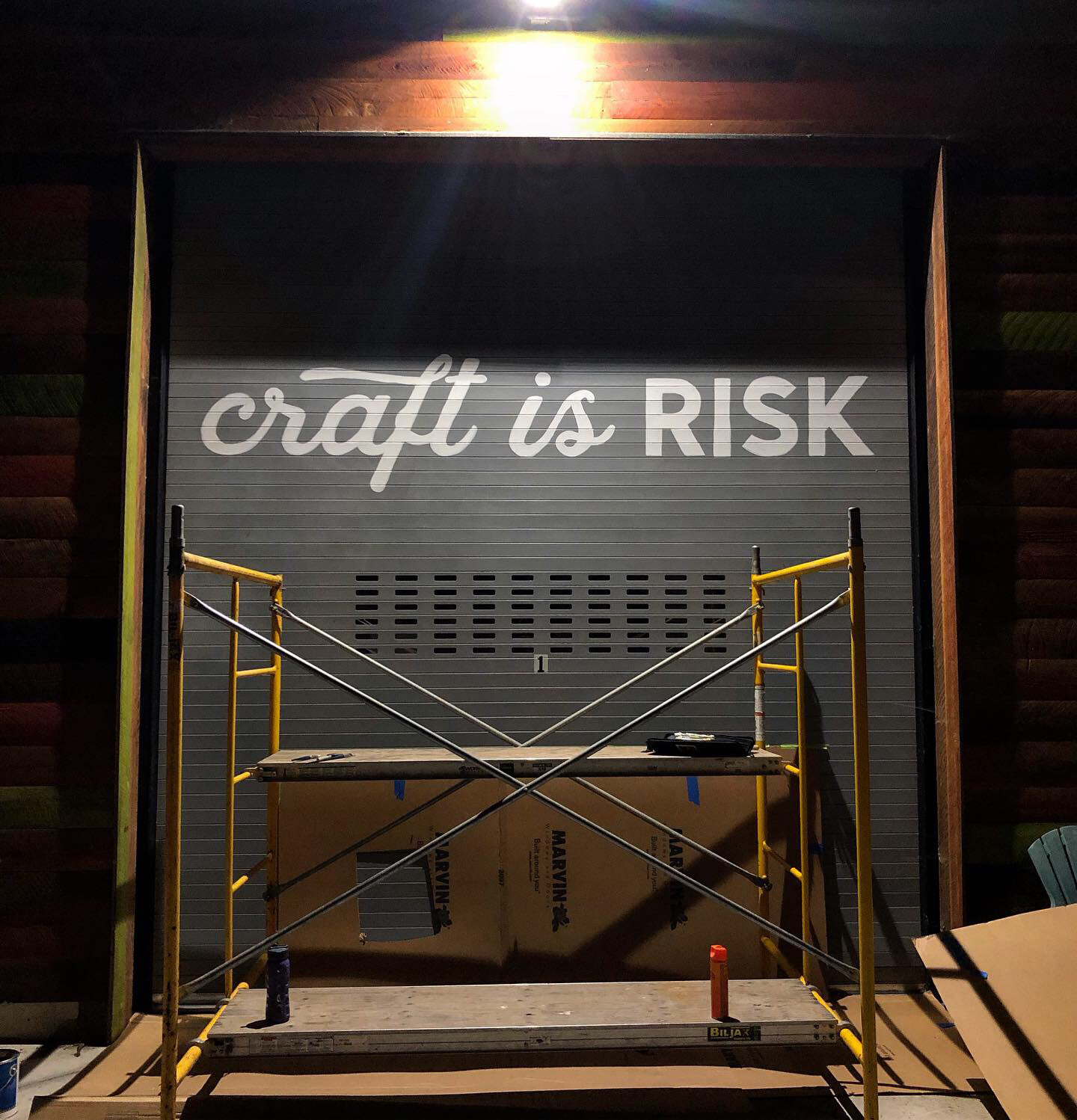 Typography Mural on a craftsmen's door.