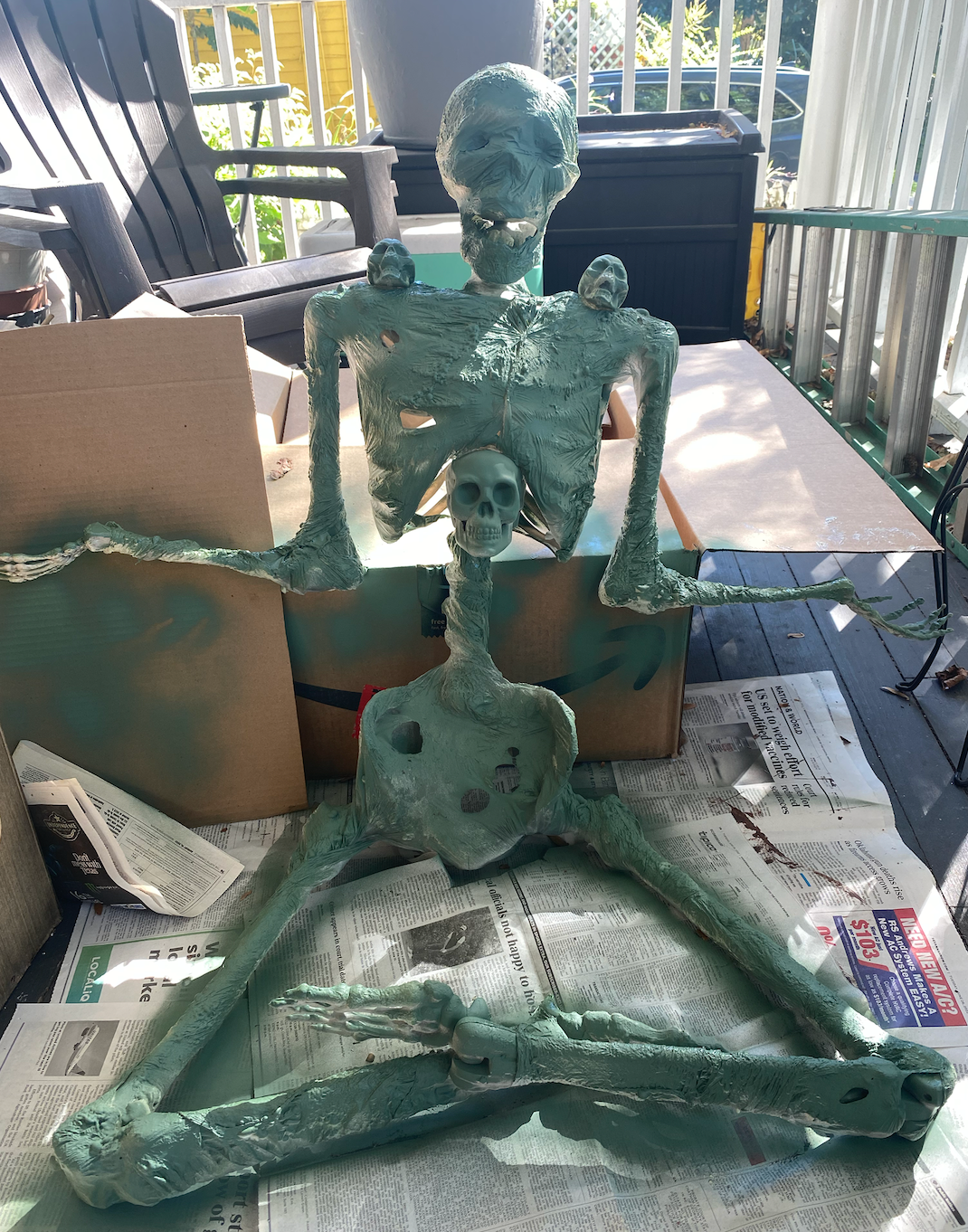 Skeleton process-first coat of paint after covering the skeleton in plastic wrap and using a heat gun to shrink and tear it to resemble flesh
