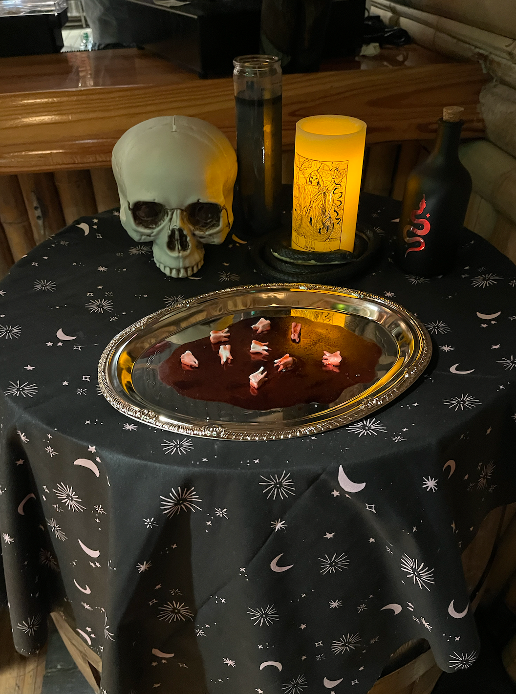 Witch doctor area prop table - found objects and modeling clay for the teeth!