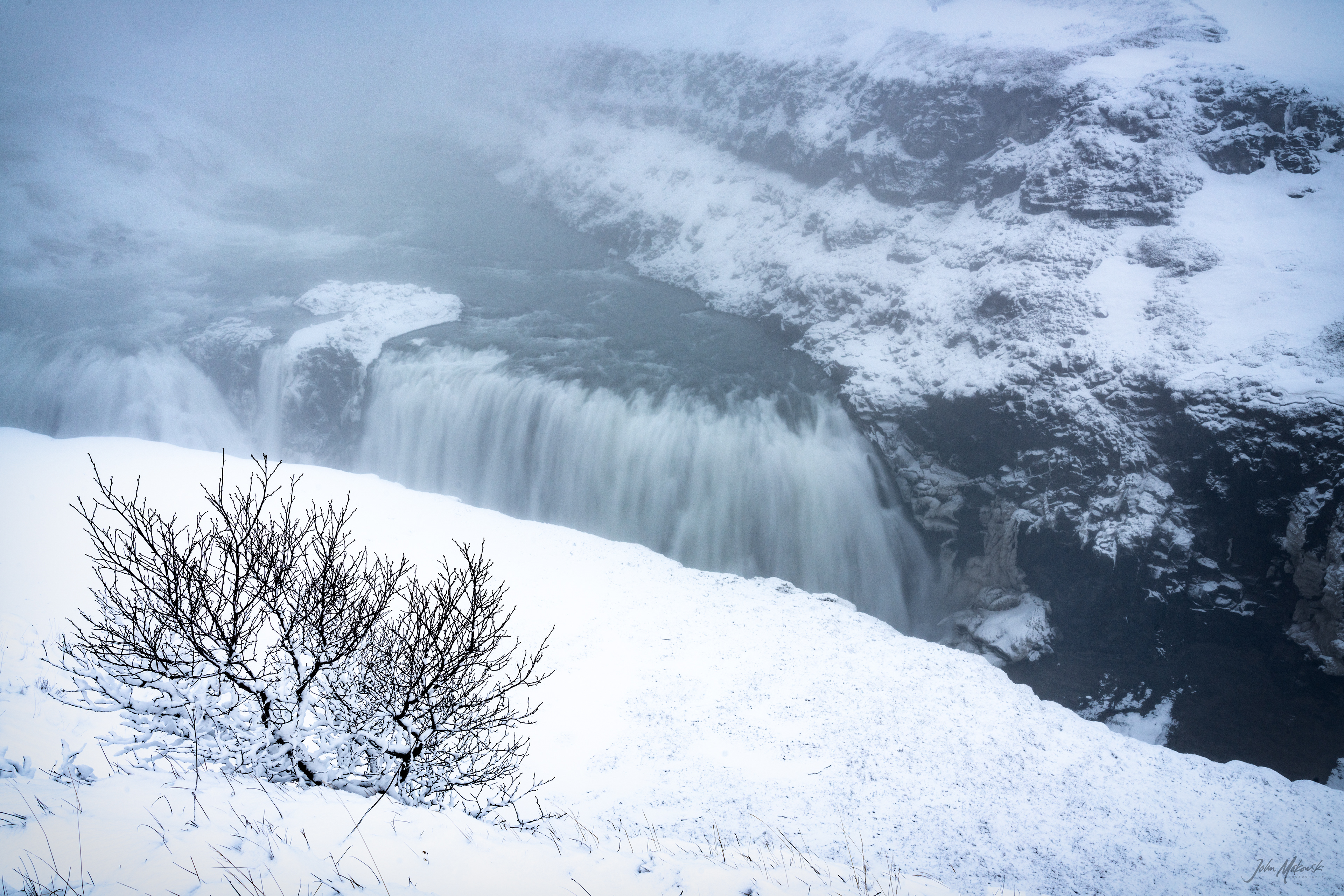 Gullfoss (Golden Falls) is the largest waterfall in all of Iceland.  The average amount of water running down the waterfall is 141 cubic metres (5,000 cu ft) per second in the summer and 80 cubic metres (2,800 cu ft) per second in the winter.