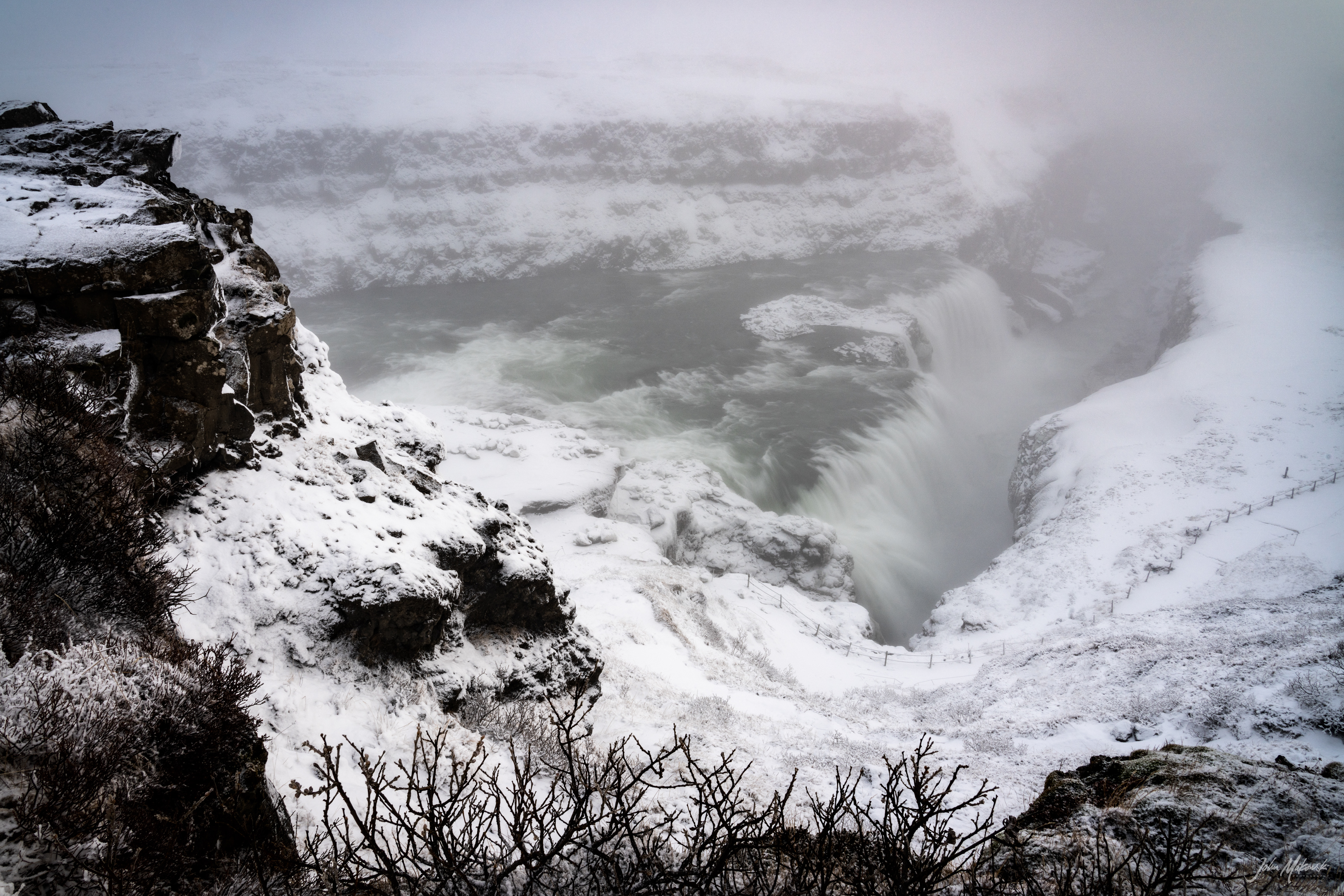 Gullfoss (Golden Falls) is the largest waterfall in all of Iceland.  The average amount of water running down the waterfall is 141 cubic metres (5,000 cu ft) per second in the summer and 80 cubic metres (2,800 cu ft) per second in the winter.