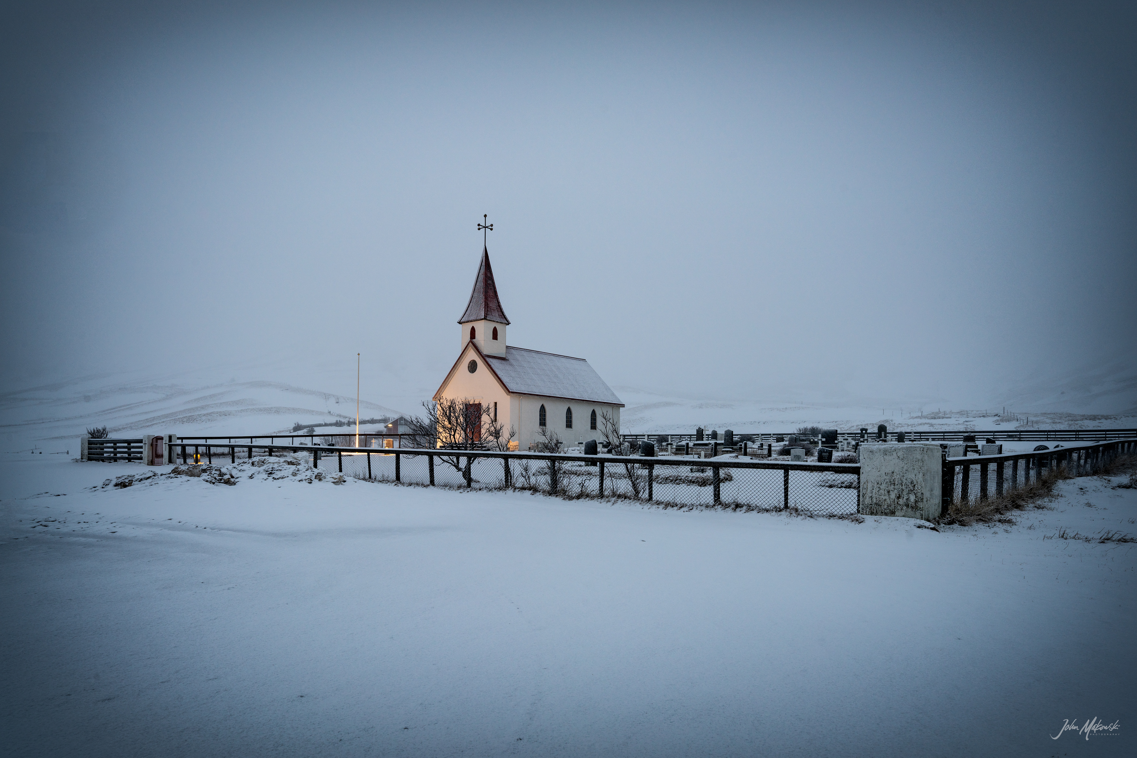Reyniskirkja Church and cemetary