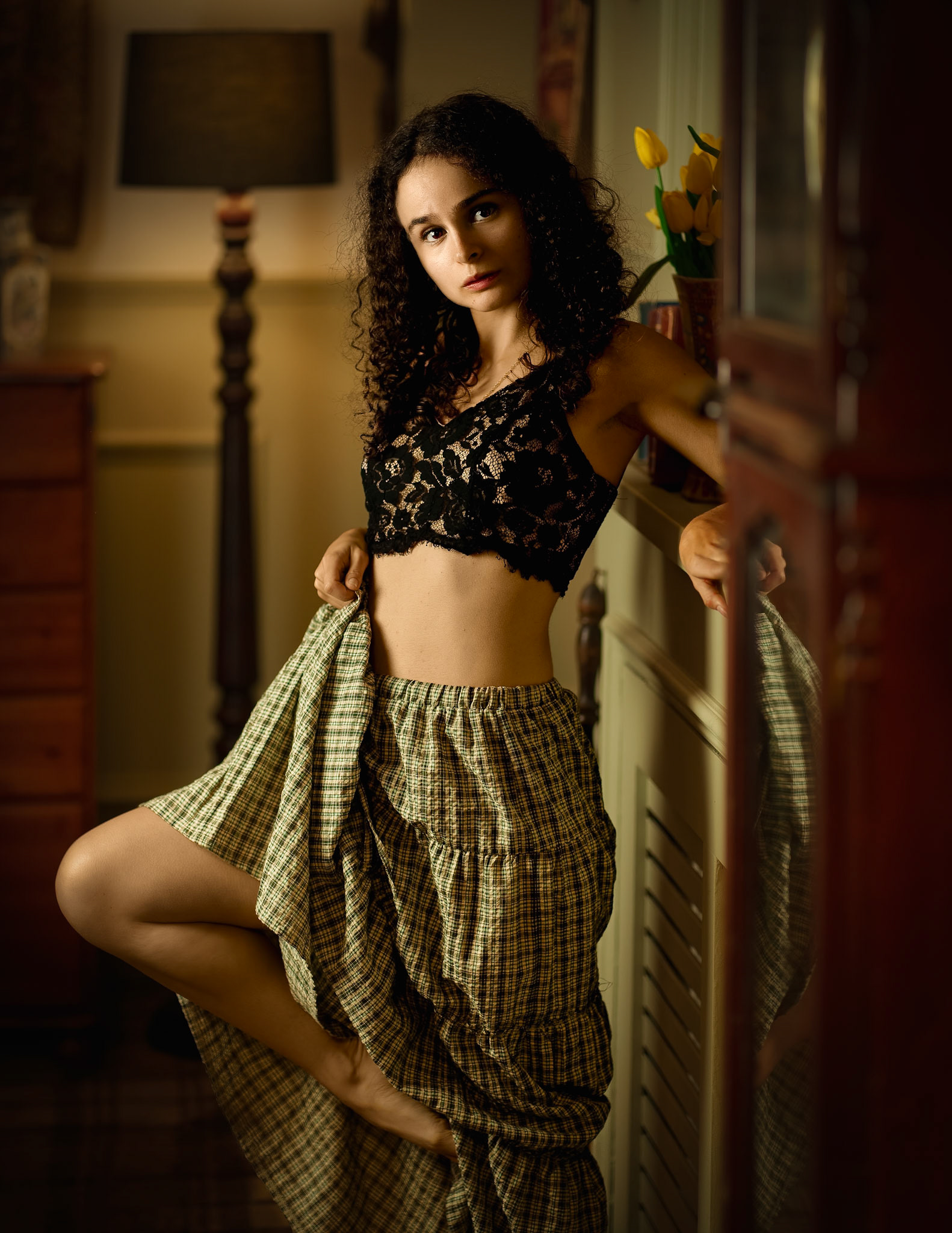 This portrait of model Kitty Dawson was taken during a session at JDL Studios in Chesterfield. Using a simple setup within an available set at the studio, the image is posed but still quite natural. JDL Studios has since relocated, making this shoot one of the last opportunities to utilise this particular space. The lighting is a single constant light off to camera left. The background light too some time to find a bulb for but it was essential to get the correct atmosphere.