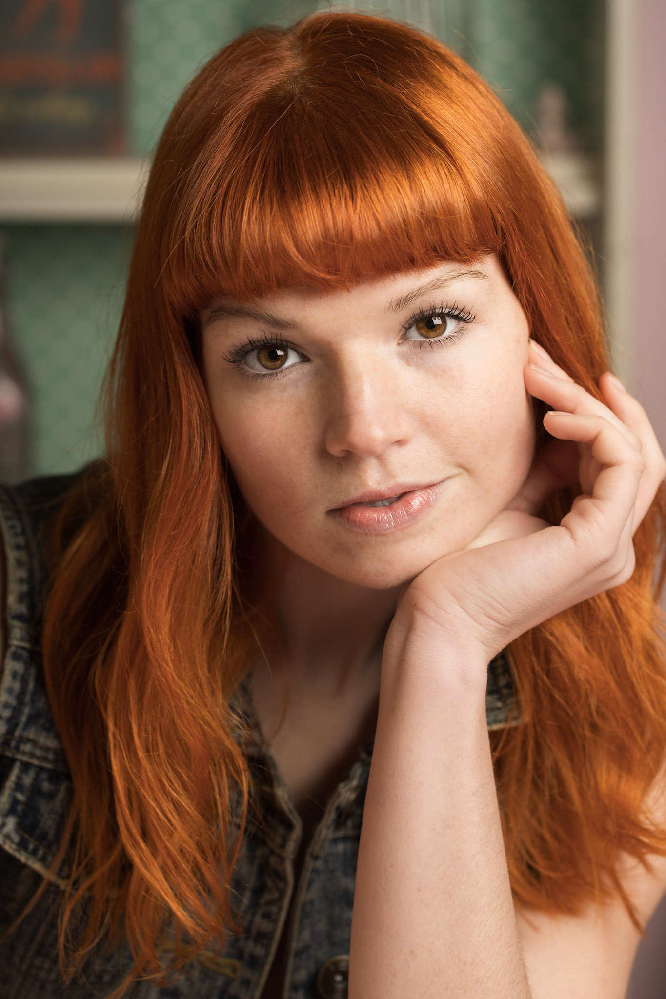 A casual but posed portrait of model Darcie Louise, captured at Montrose Studio in Stockport. With only an hour to shoot, I made the most of the time, taking a variety of images that truly highlight her presence. I was especially drawn to her vibrant red hair, which complemented the warm, intimate lighting of the session. Darcie was a fantastic subject to work with, bringing a natural elegance and depth to every shot.