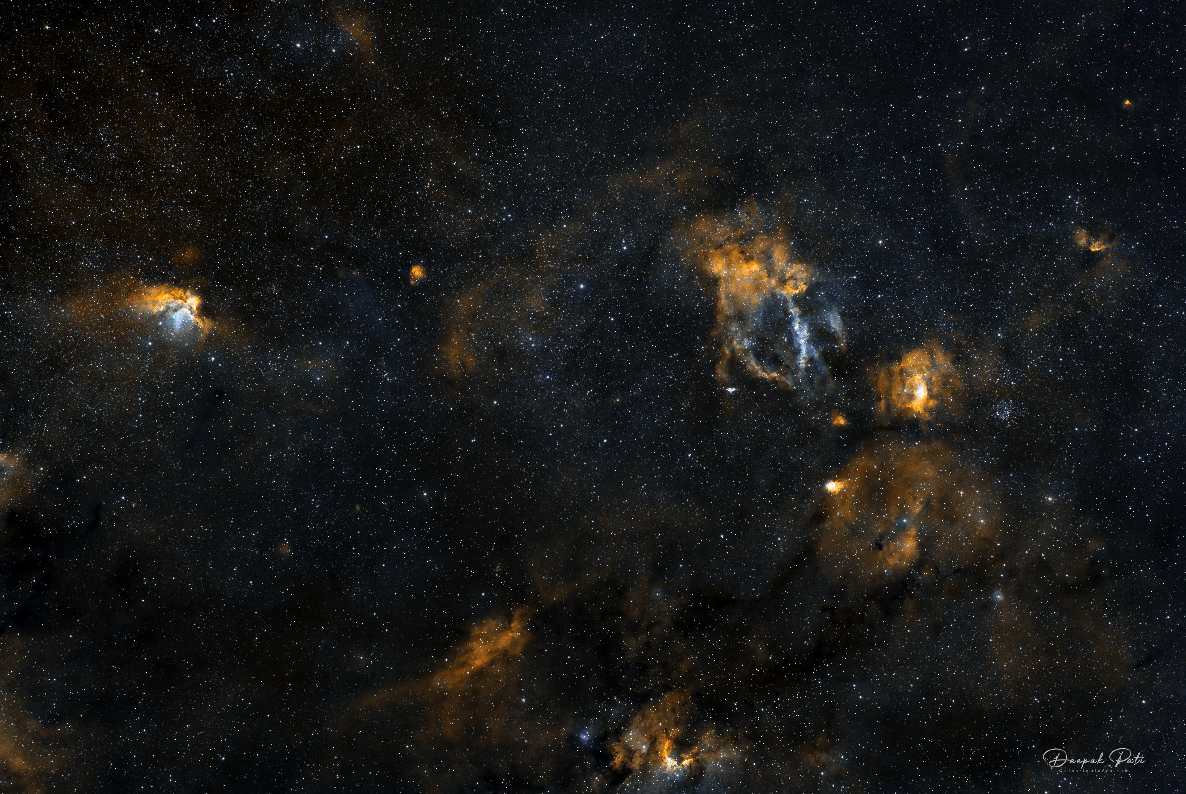 Wide-field view of the Wizard, Lobster Claw (Hubble Palette)