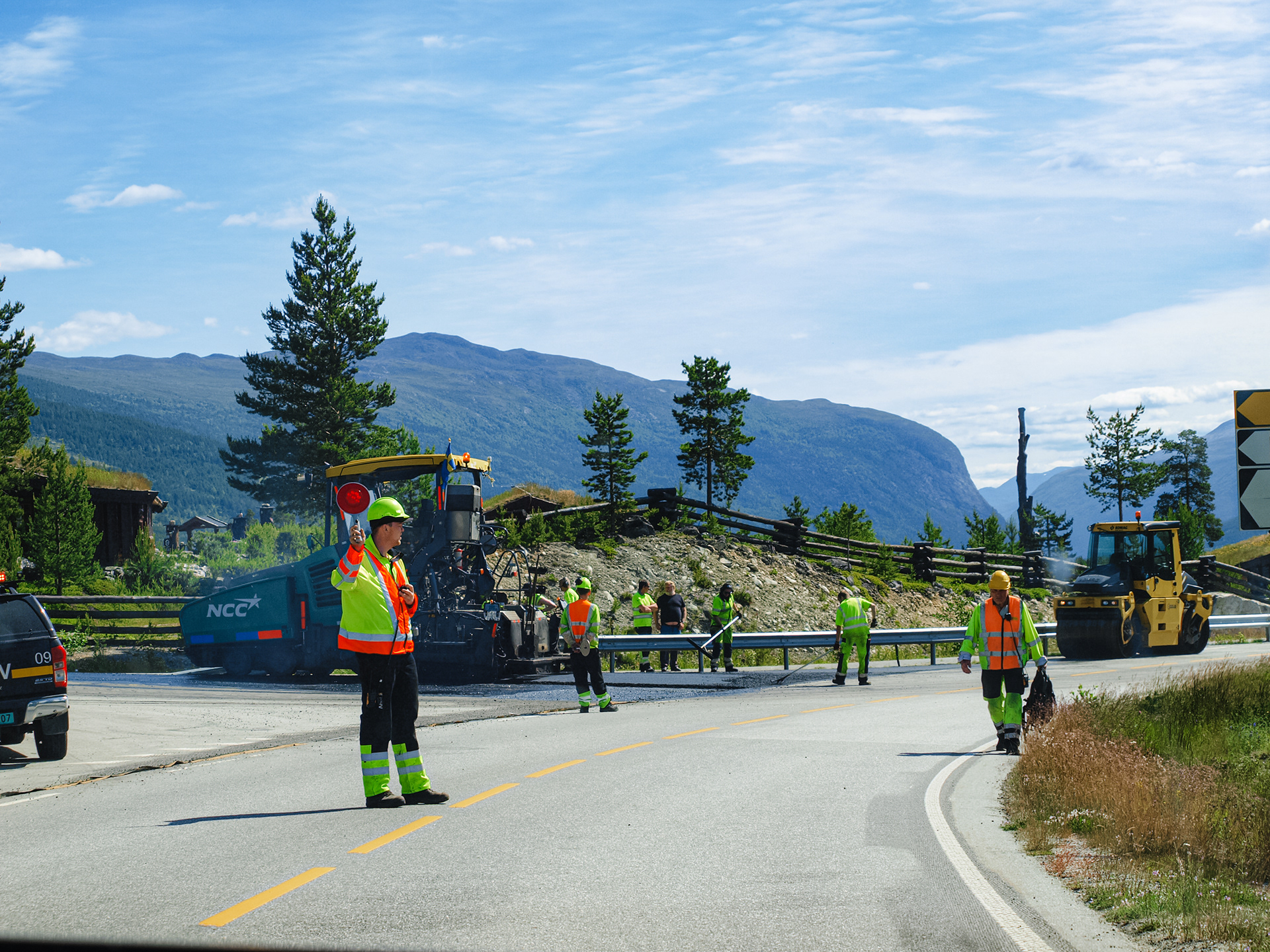 Workers paving a section of road on the drive to Dovrefjell