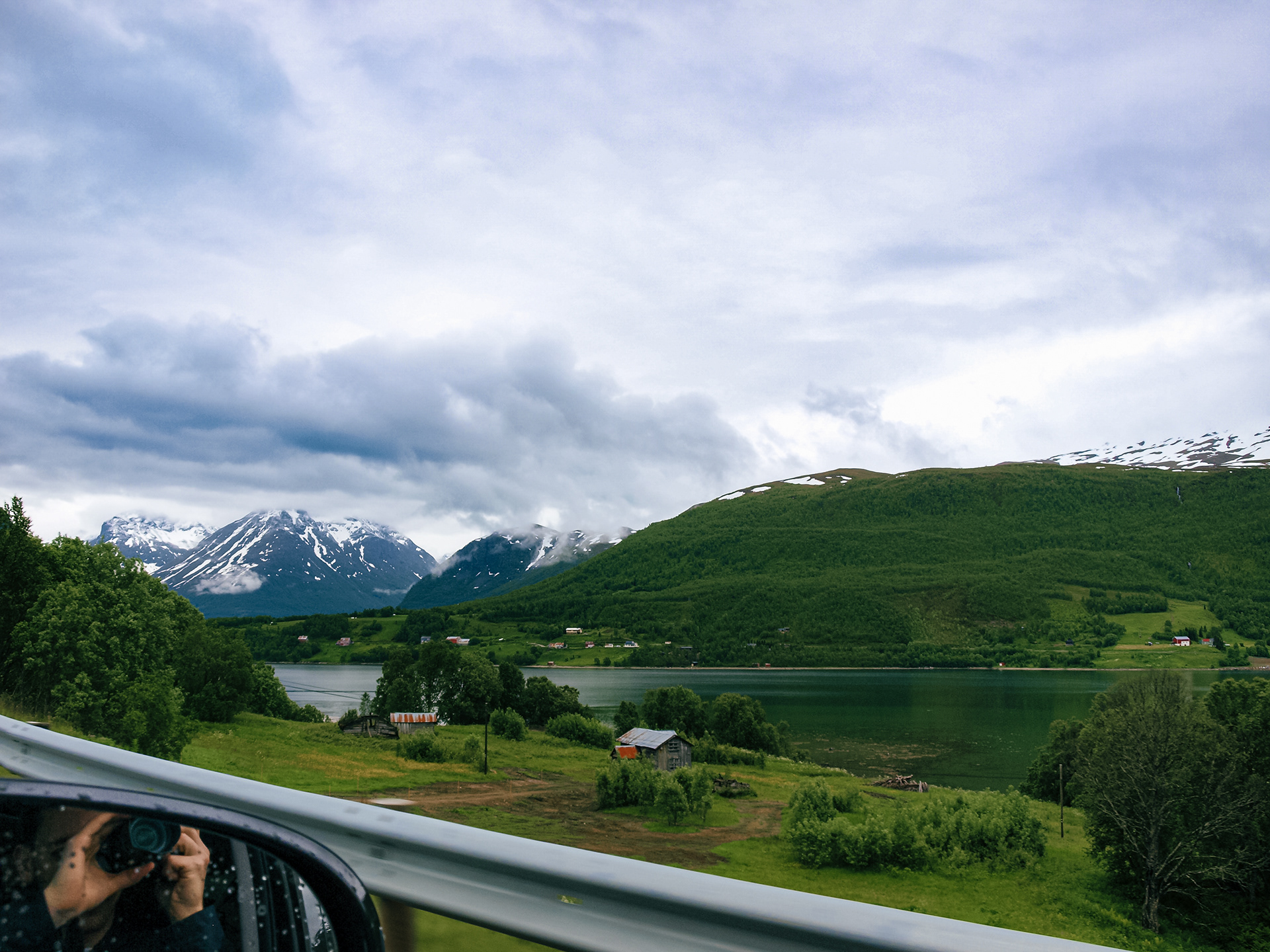 James captures a mountain scene from the car on the road to Segla on the island of Senja