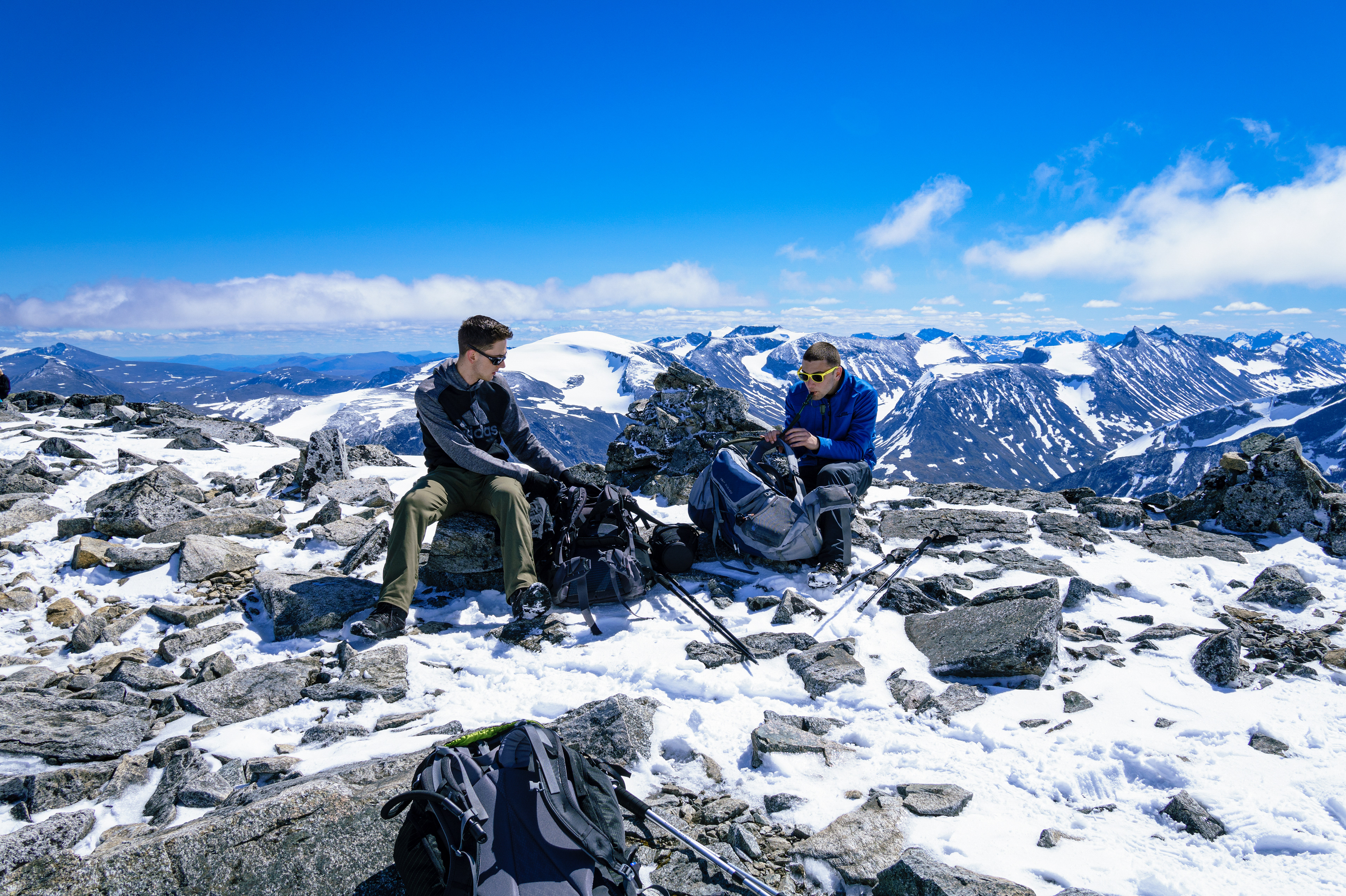 James and Nick pause to rehydrate during the hike to the summit of Galdhøpiggen