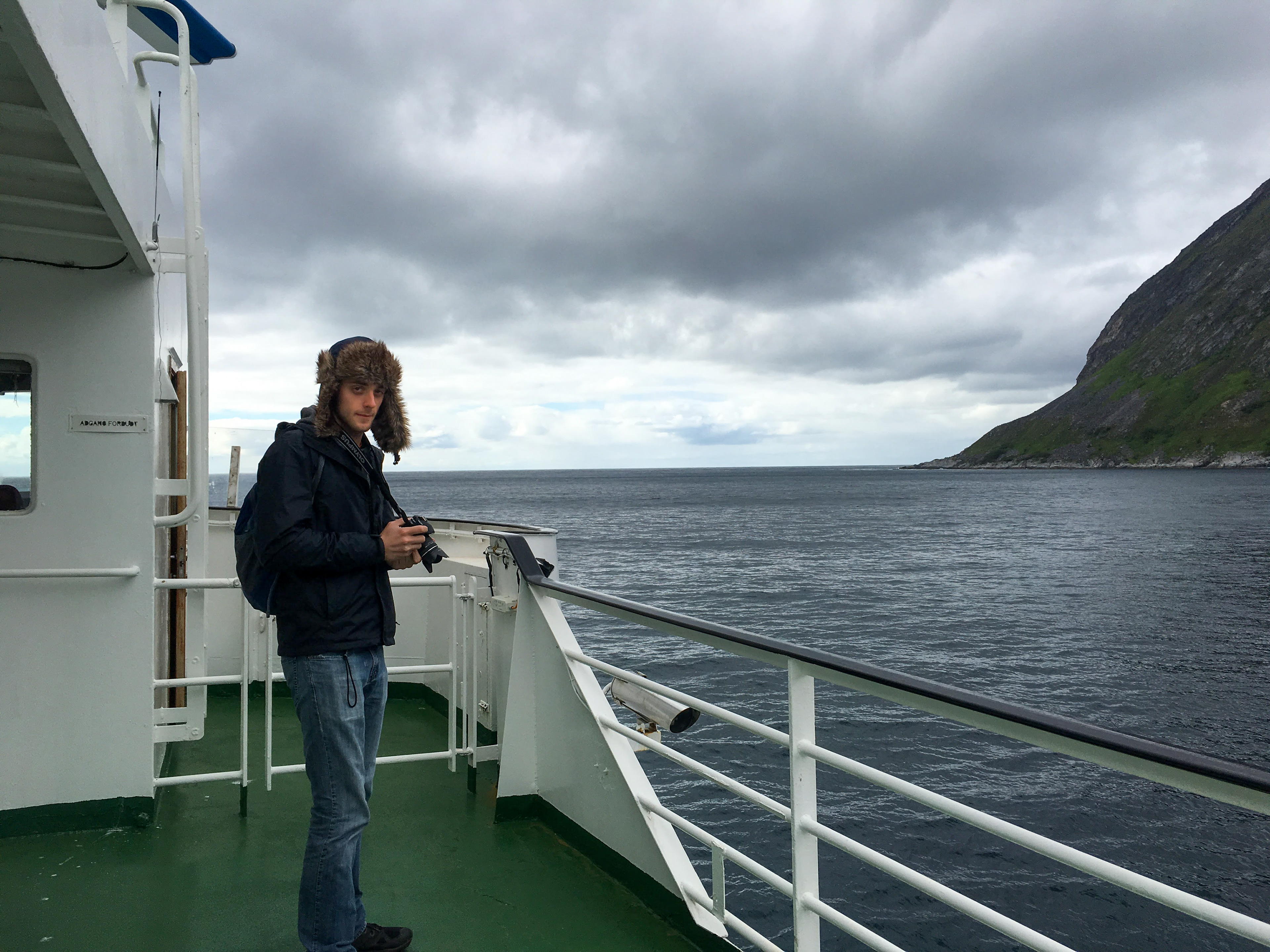 James looks for a good composition on the ferry from Senja to start the final drive to Lofoten