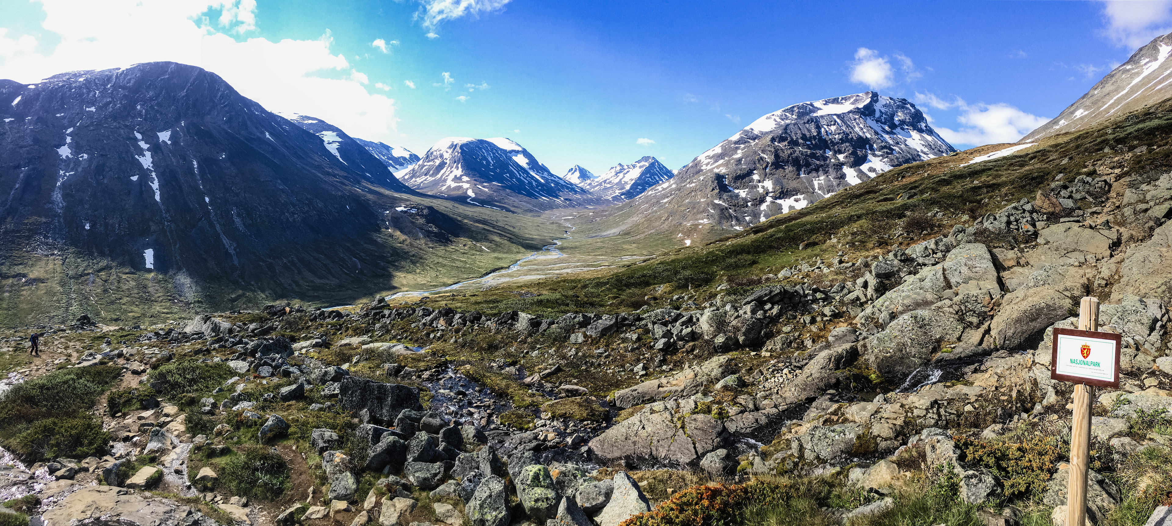 A panoramic view of Visdalen valley in Jotunheimen Nasjonalpark, captured at the start of the day-long hike to the summit of Galdhøpiggen