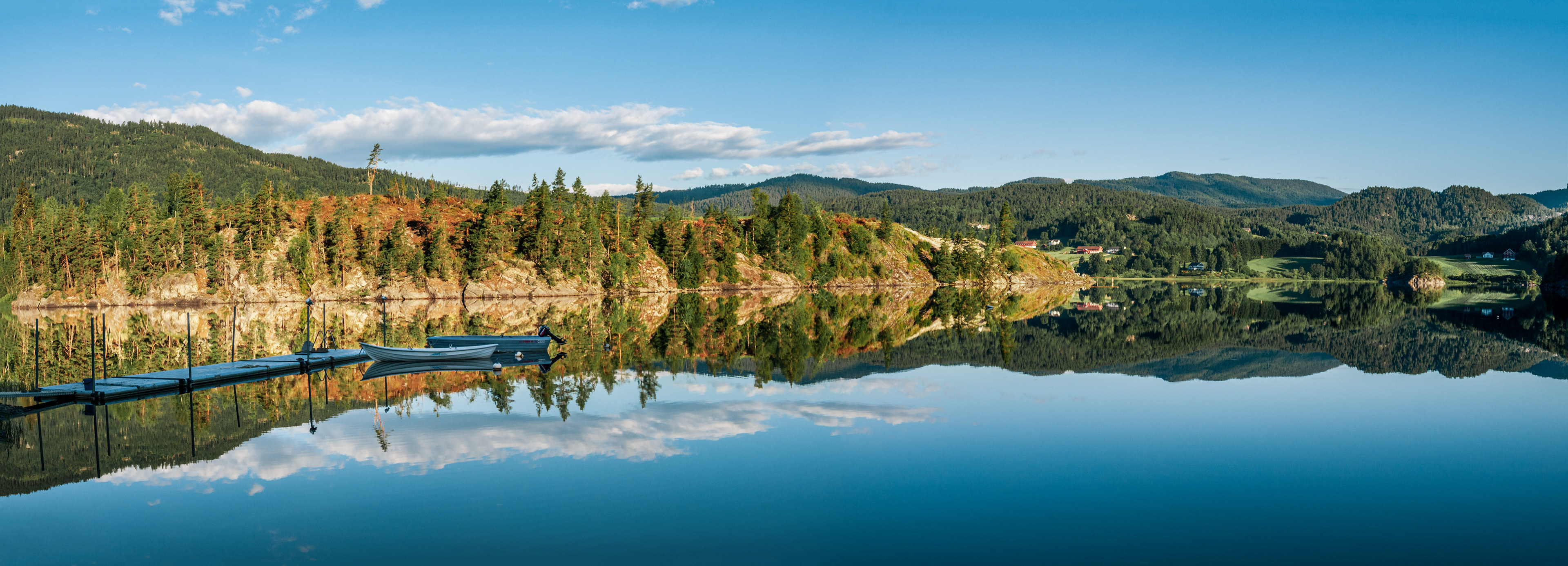 Early morning reflections on Heddalsvatnet (Lake Heddal) in Notodden, Norway