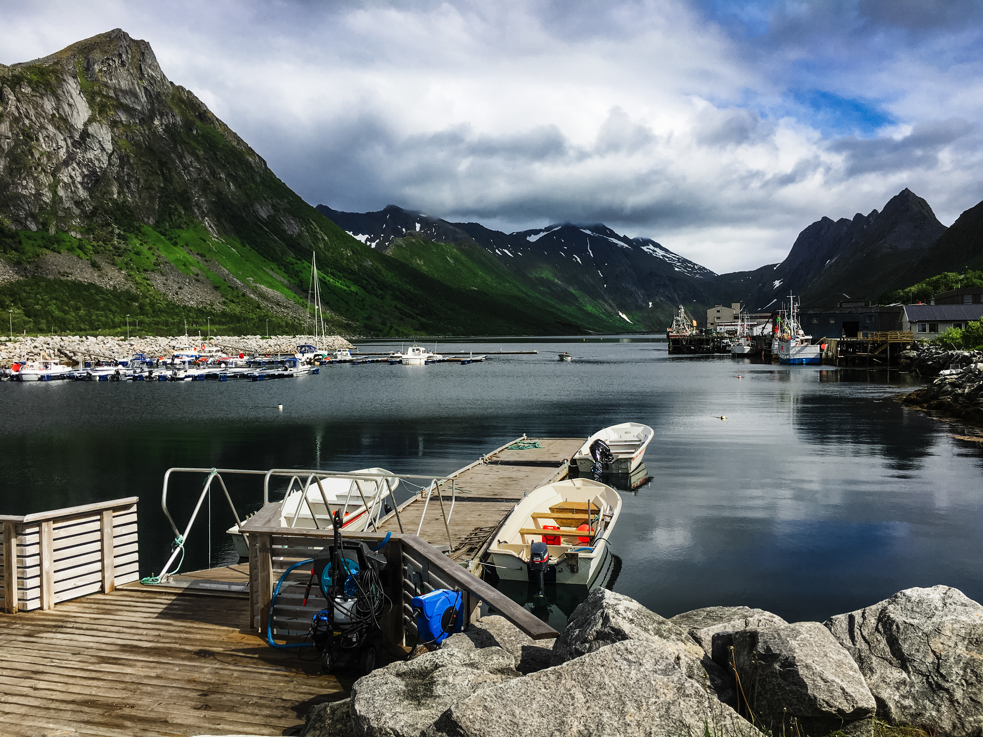 Tall mountains visible from a dock near the ferry to get to the Lofoten archipelago
