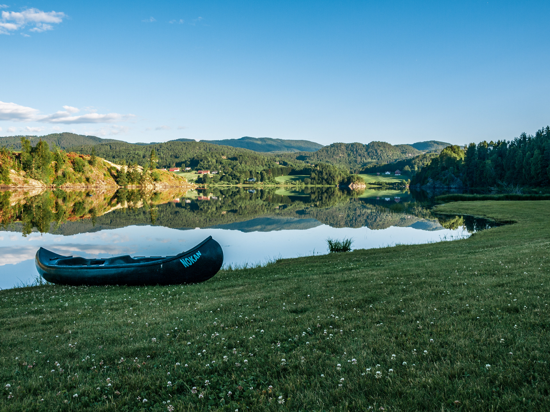 A canoe awaits its next voyage at Heddalsvatnet in Notodden