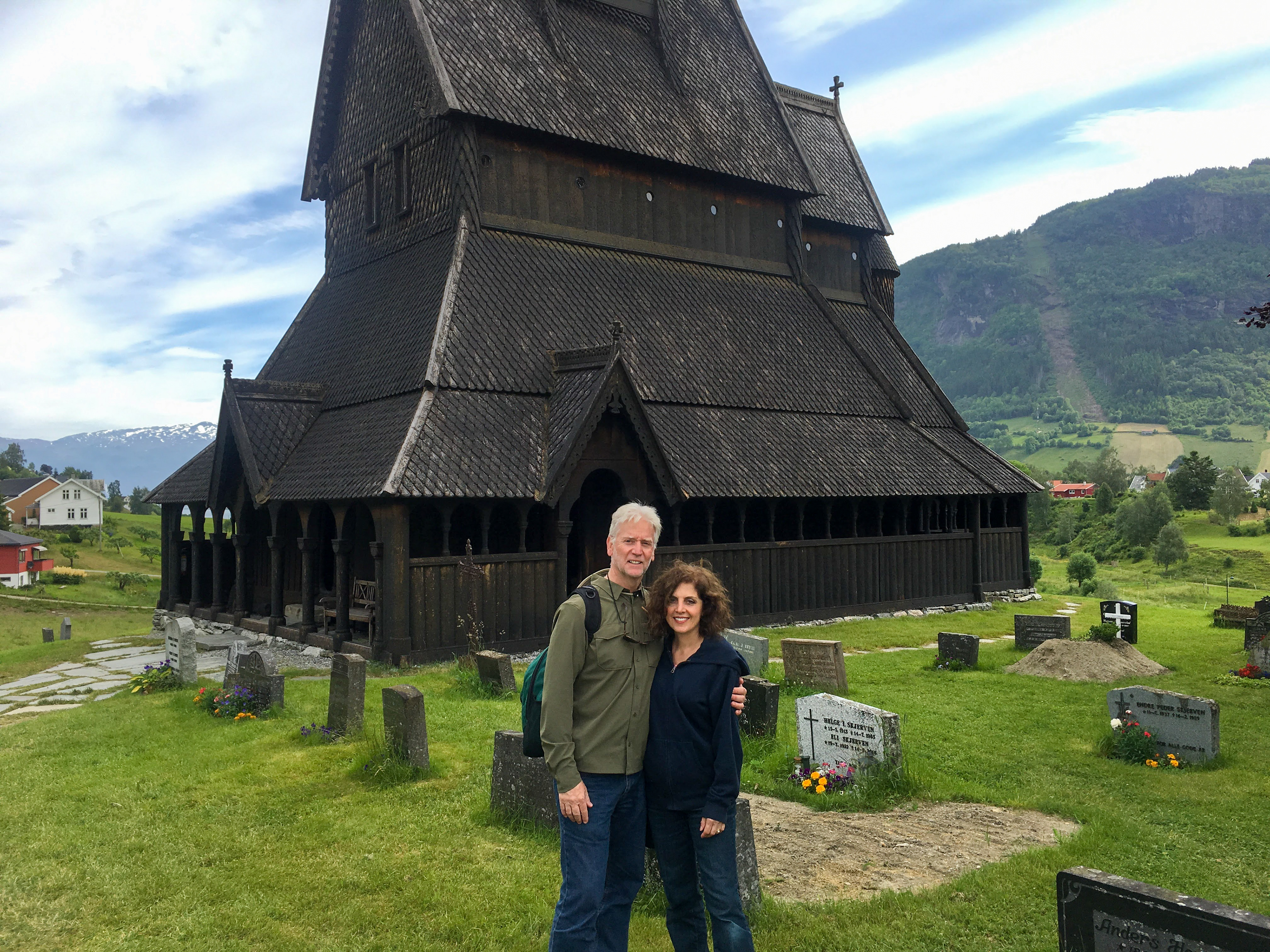 Bob and Paula pose in front of a stave church near Bergen
