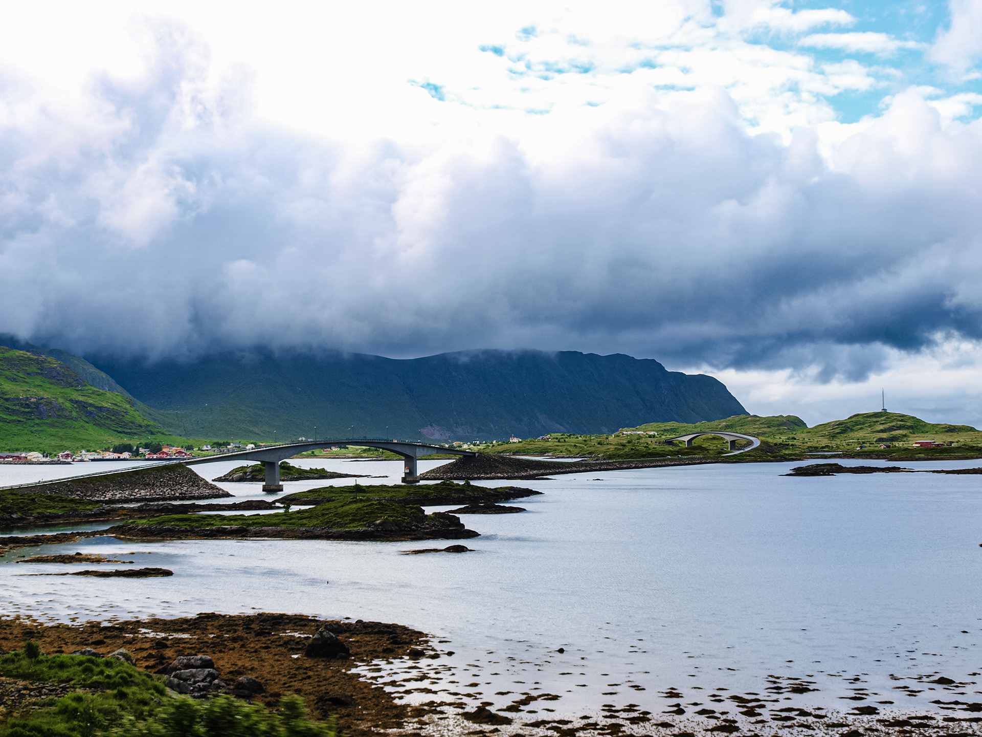 A raised bridge appears as we approach Reine
