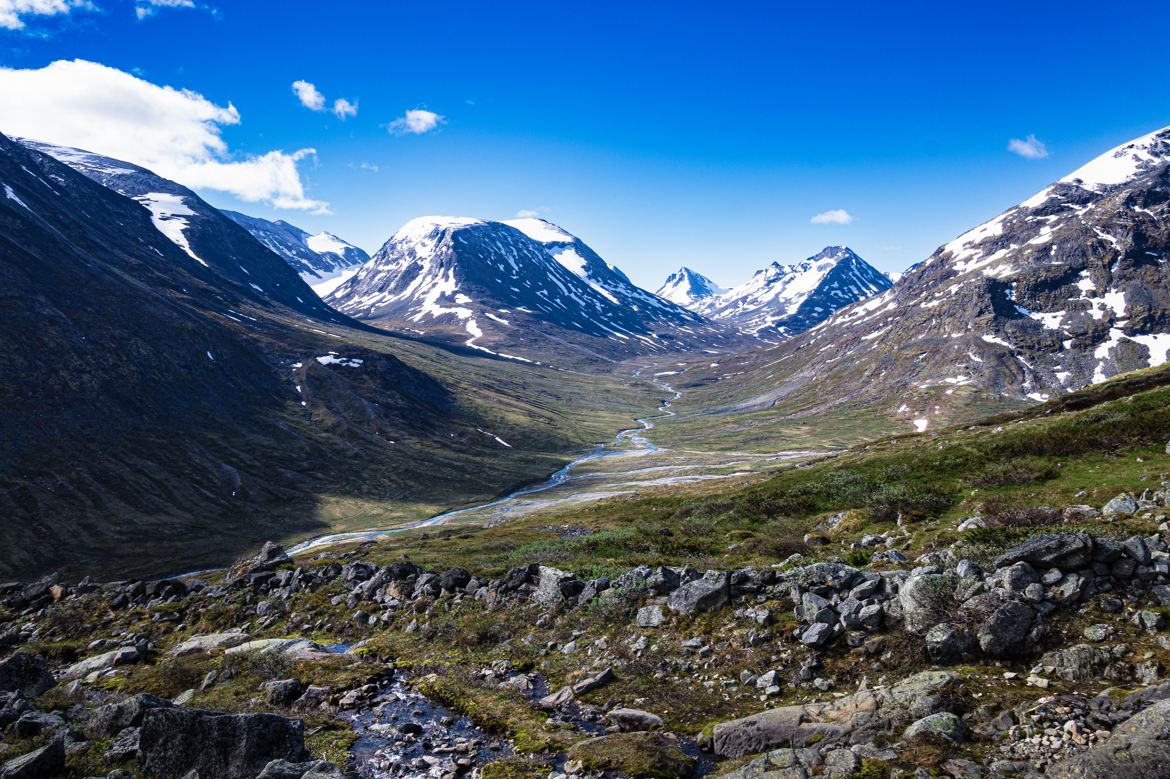 A view of mountain streams meandering down into Visdalen valley within Jotunheimen Nasjonalpark