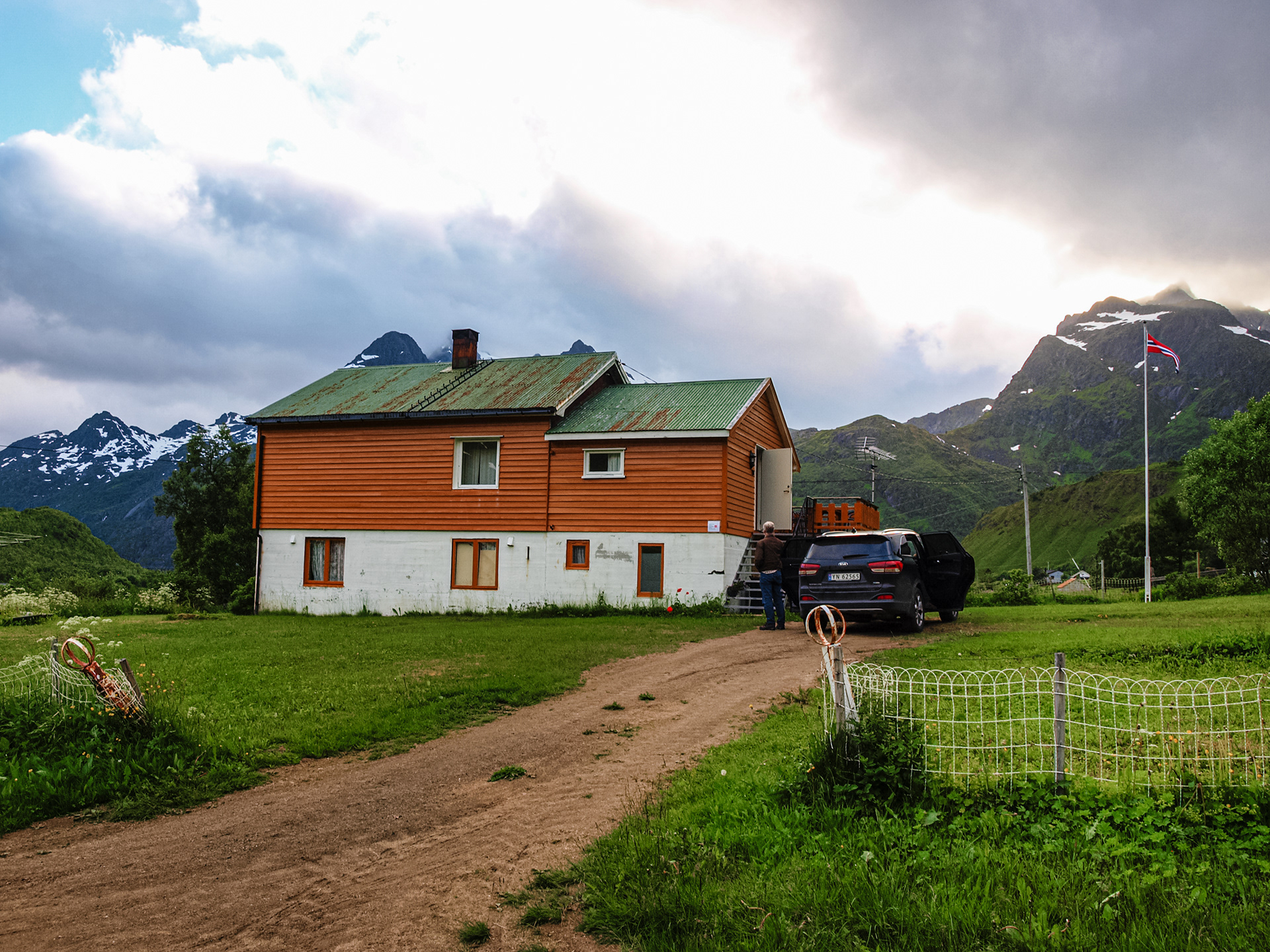 A farmhouse serves as lodging for the night somewhere along the winding Lofoten road