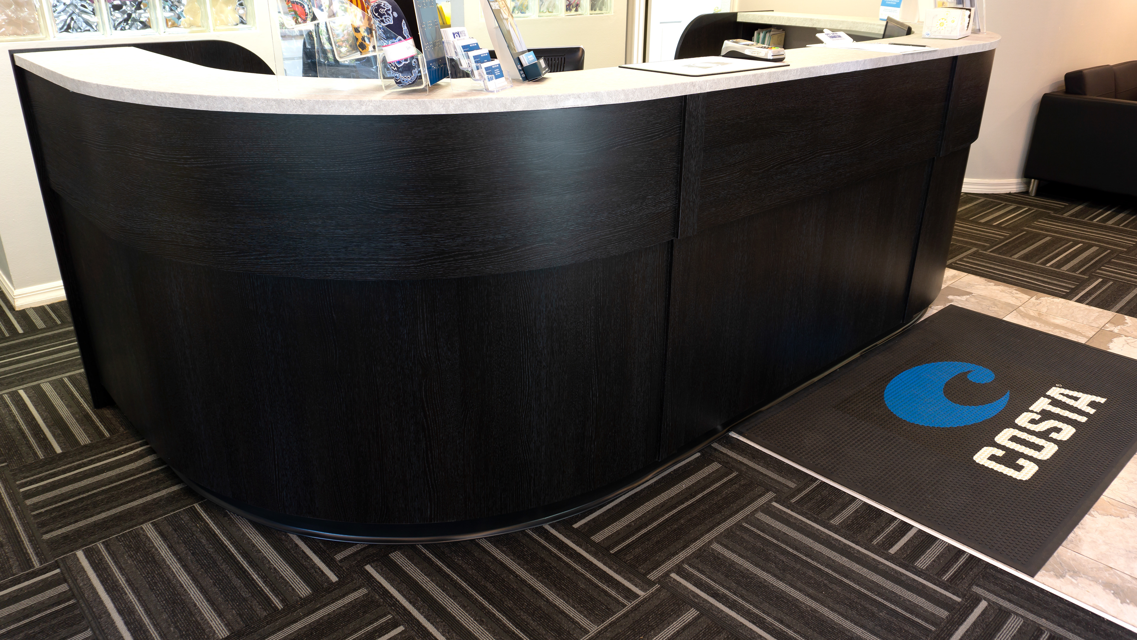 Doctor's office greeter station resurfaced with 3M DI-NOC WG-1050