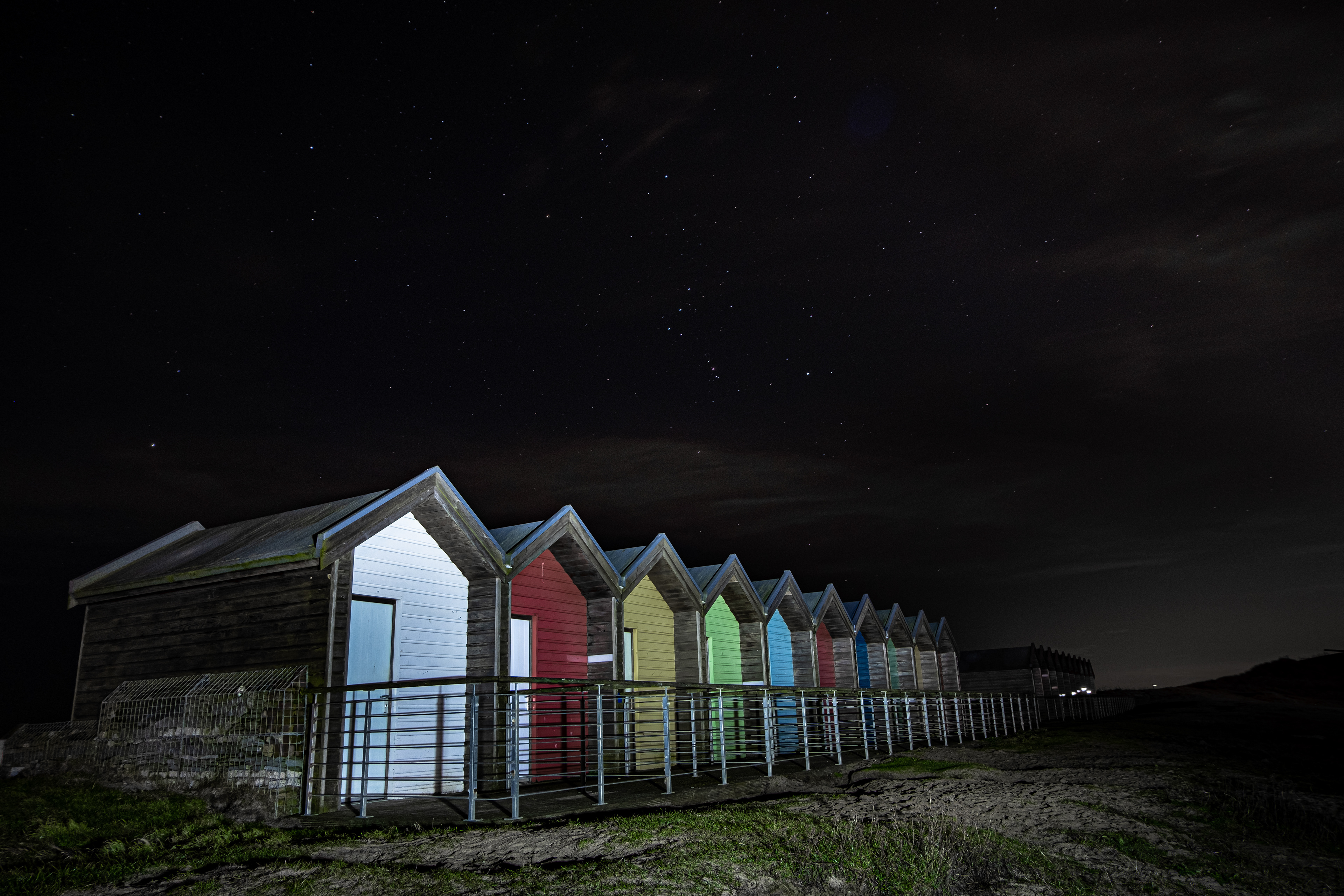 Blyth Beach huts at night