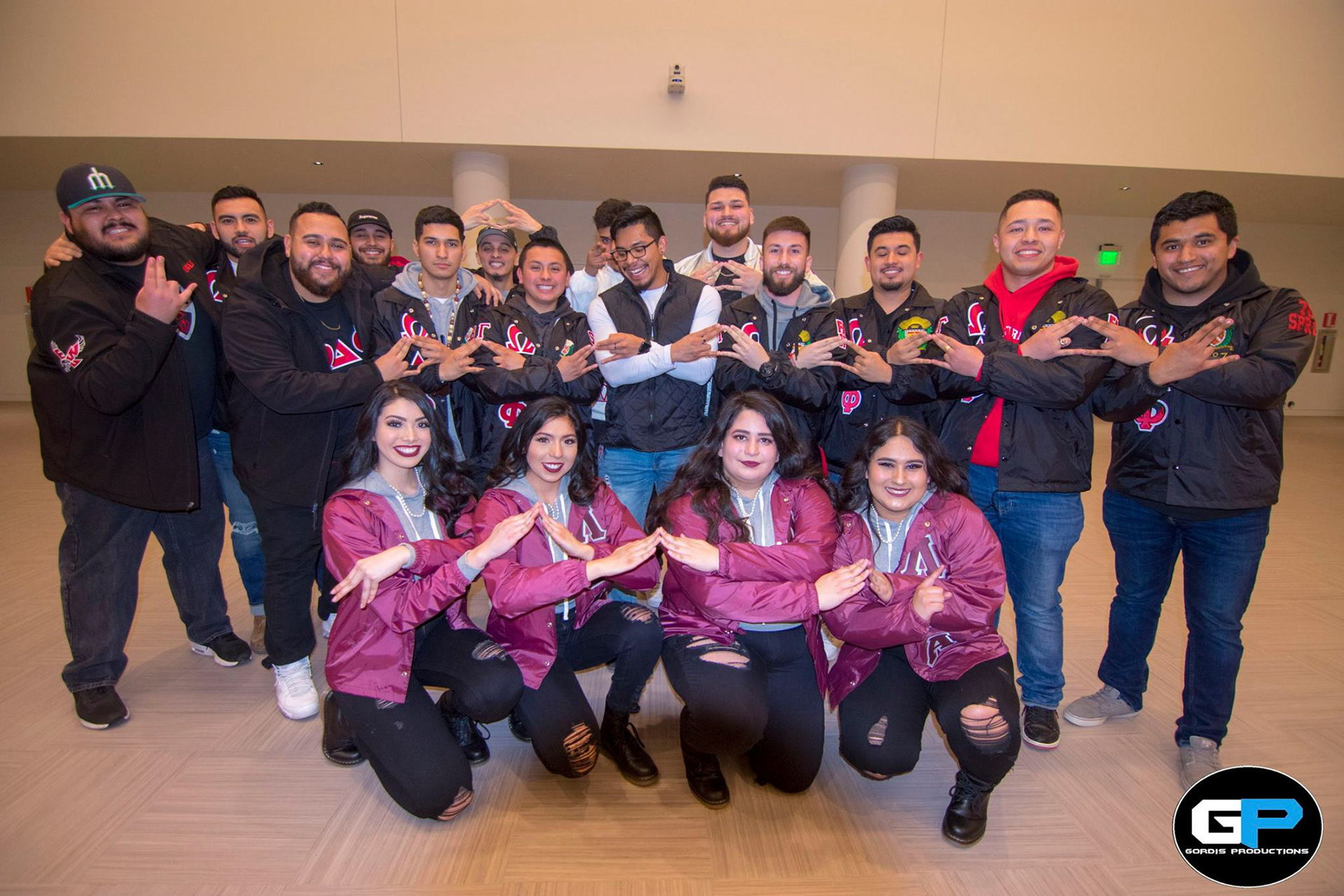 Omega Delta Phi Fraternity Inc. with Lambda Theta Latin Sorority Inc. members