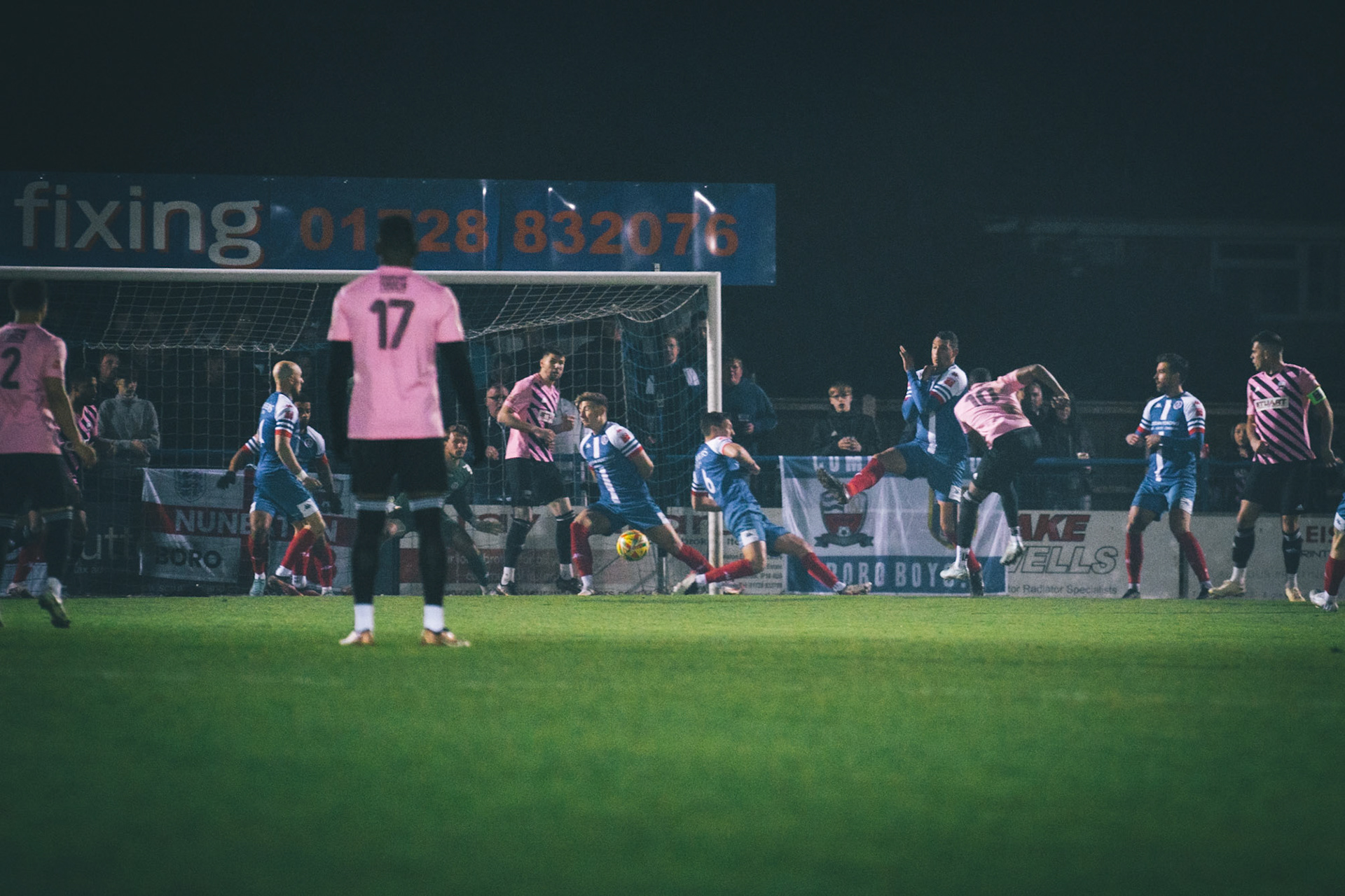loose ball breaks to Kane RICHARDS who puts needham 1 nil up