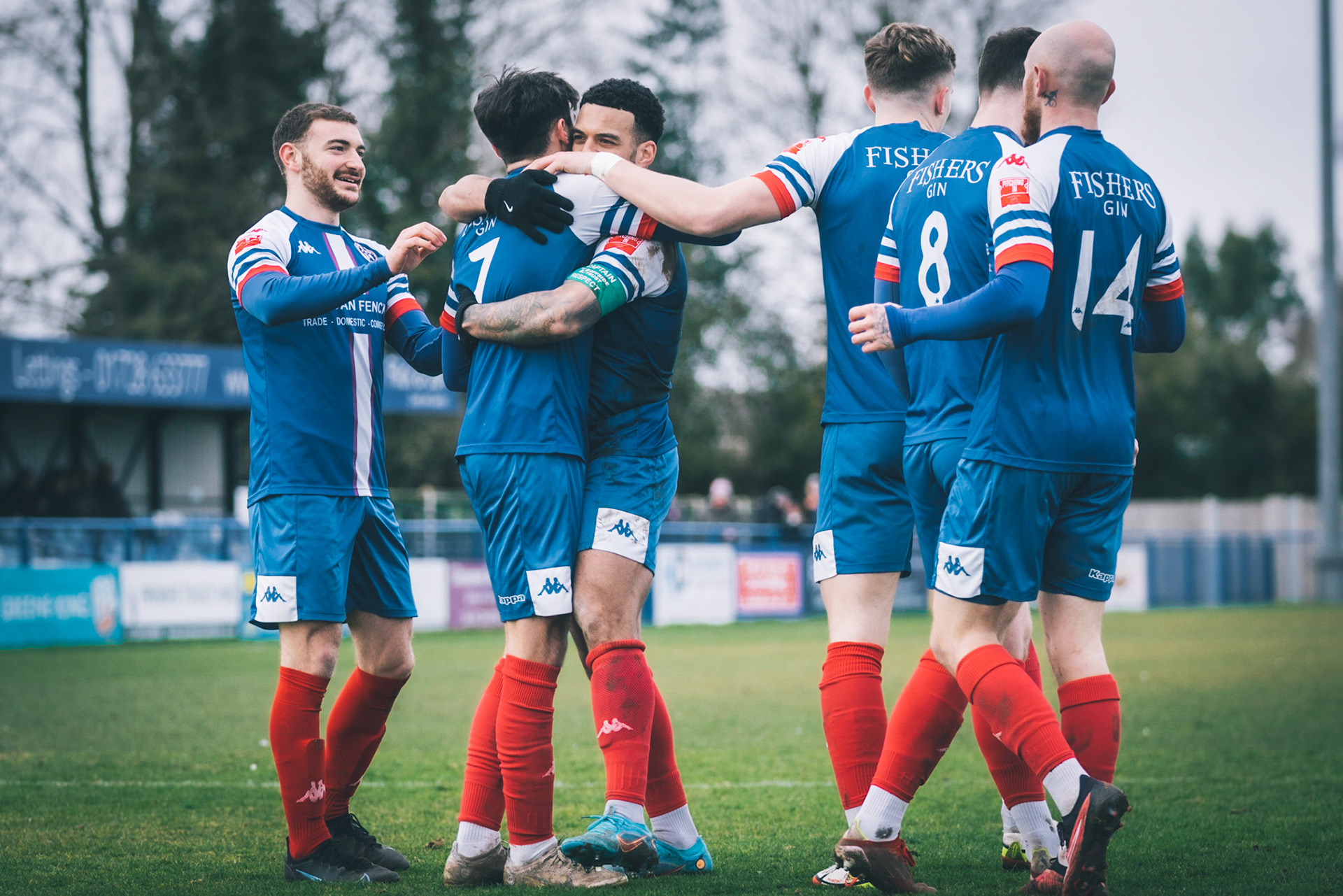 Leiston celebrating with Captain Seb Dunbar hugging goal scorer Fin Barnes