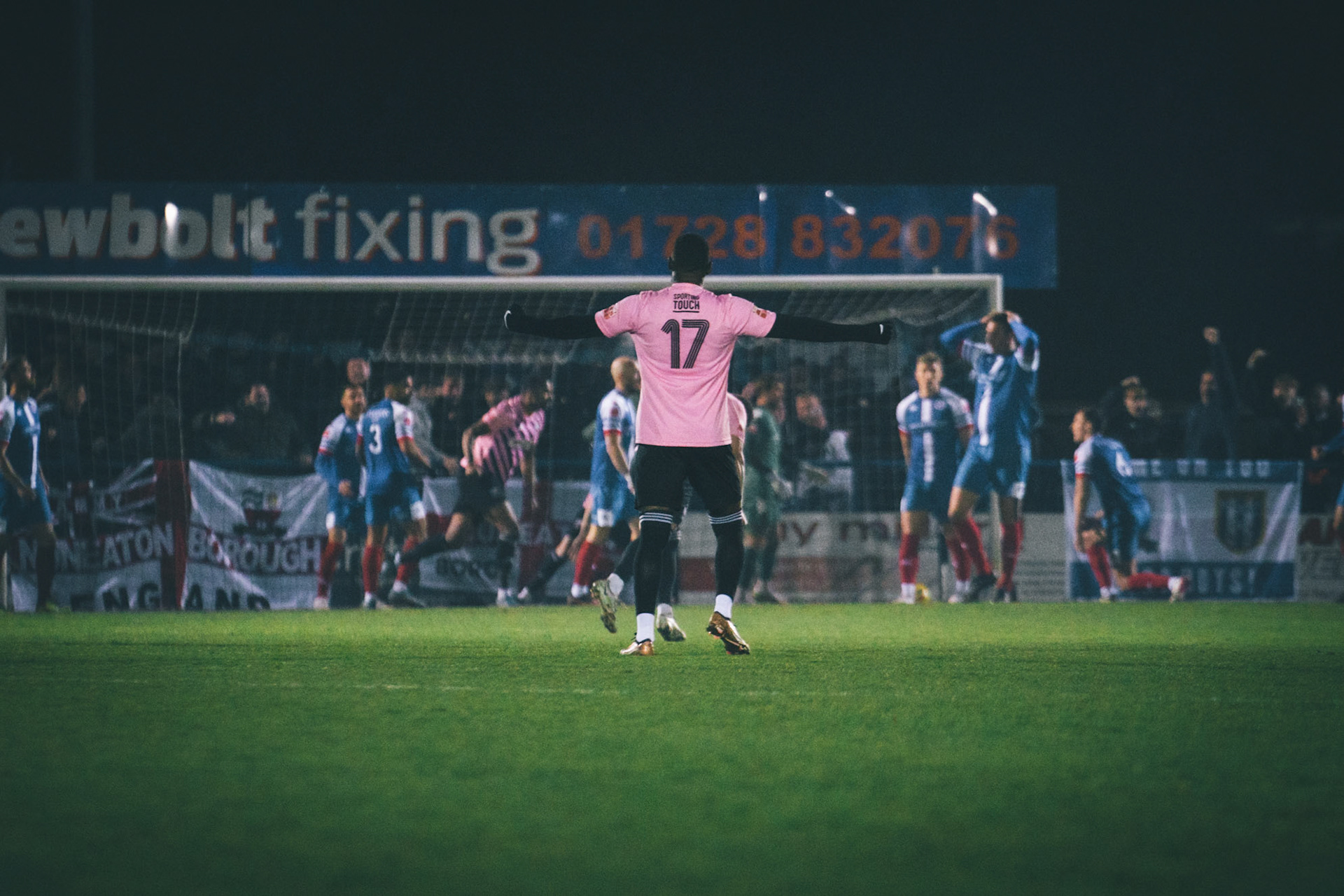 loose ball breaks to Kane RICHARDS who puts needham 1 nil up