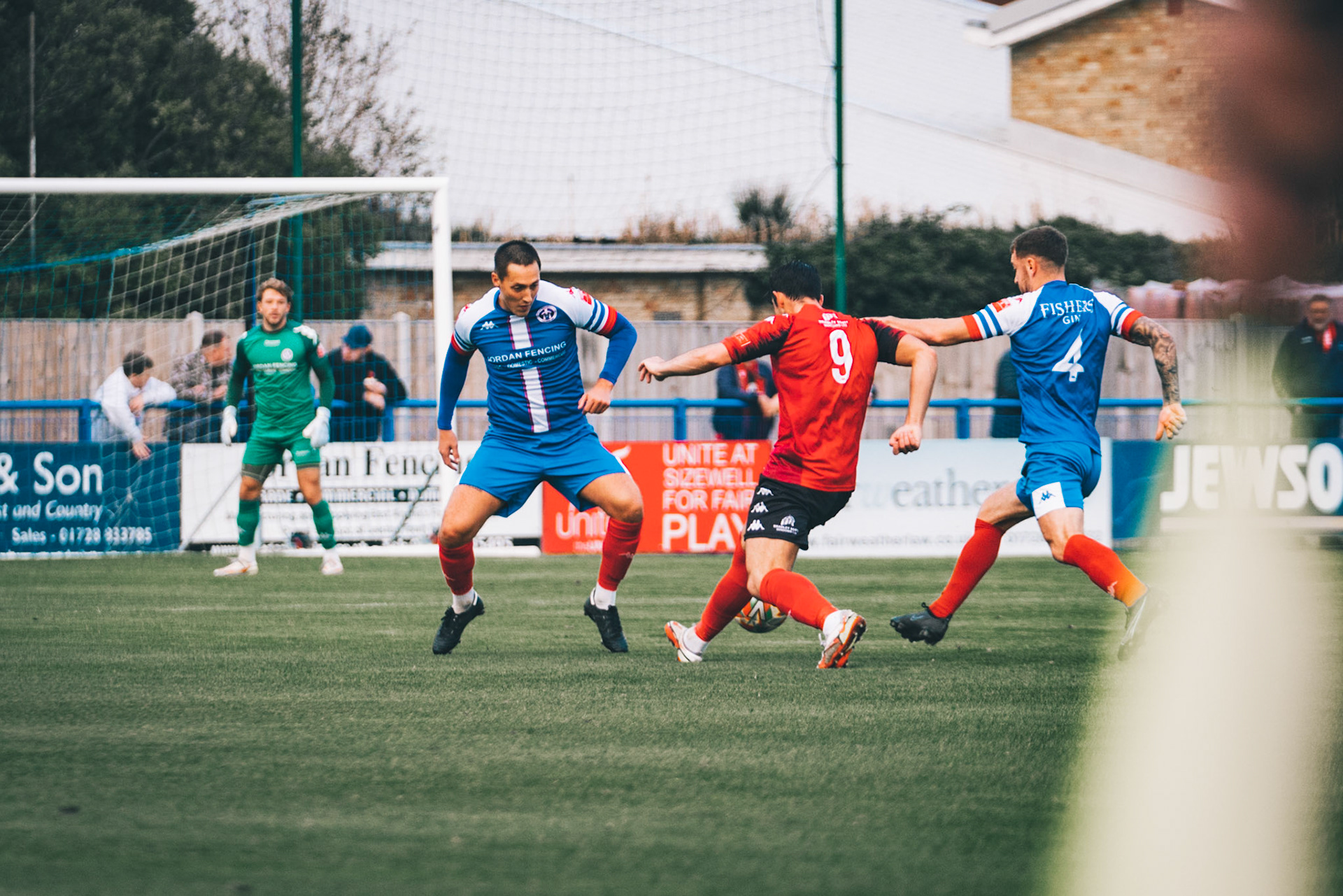 Jake Hutchings and ollie Saunders holding up no.9