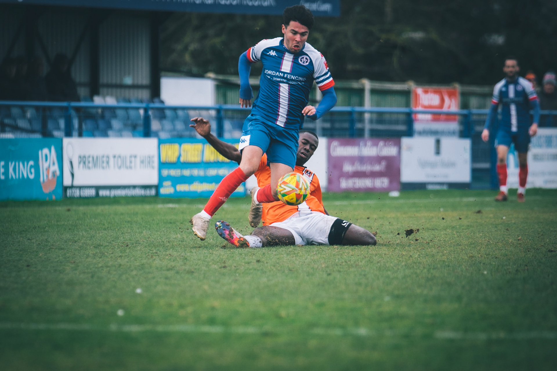 Fin Barnes taking on Stratford full back