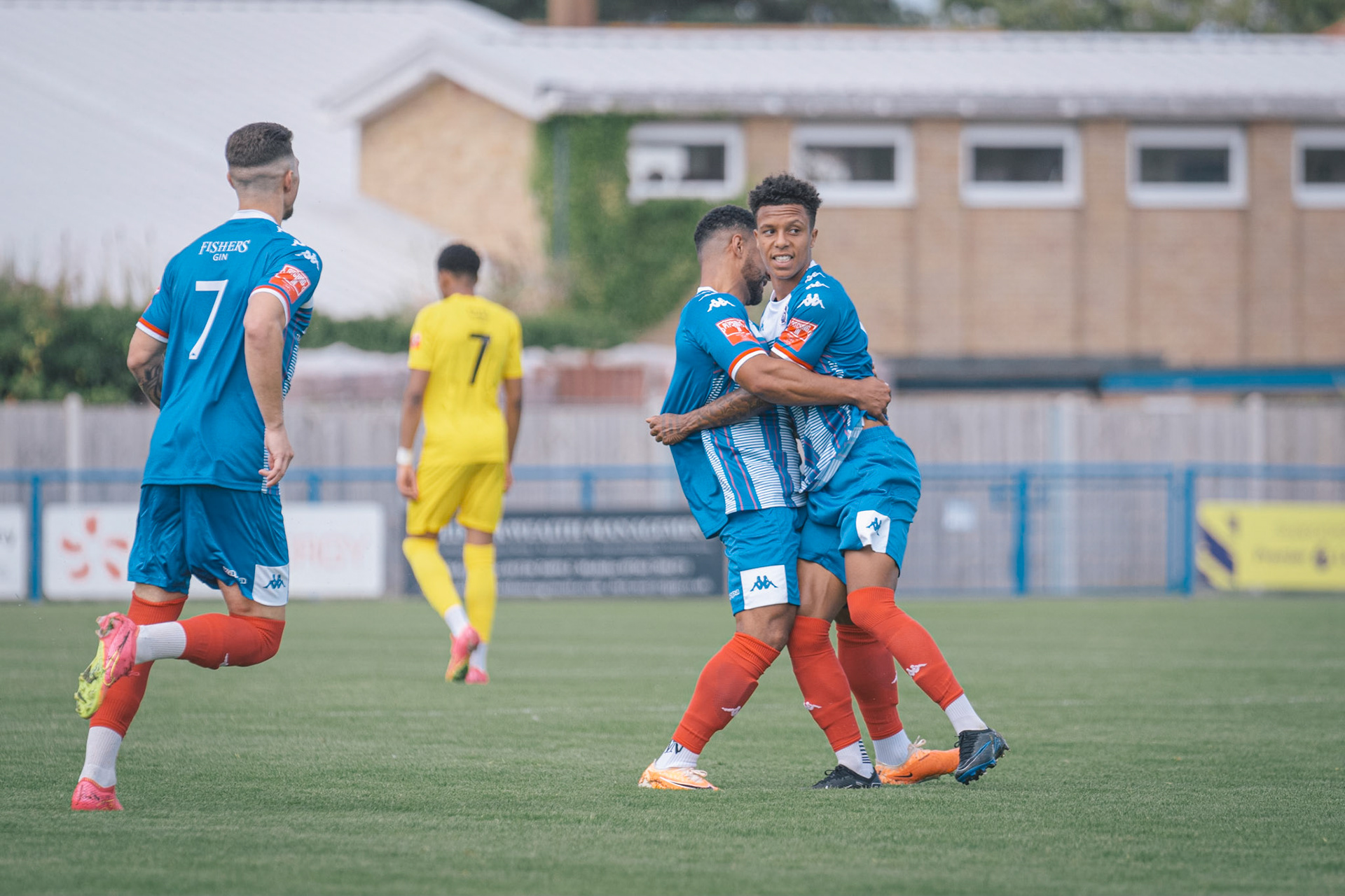 leiston goal scorer spencer keller celbrating with blues captain seb dunbar