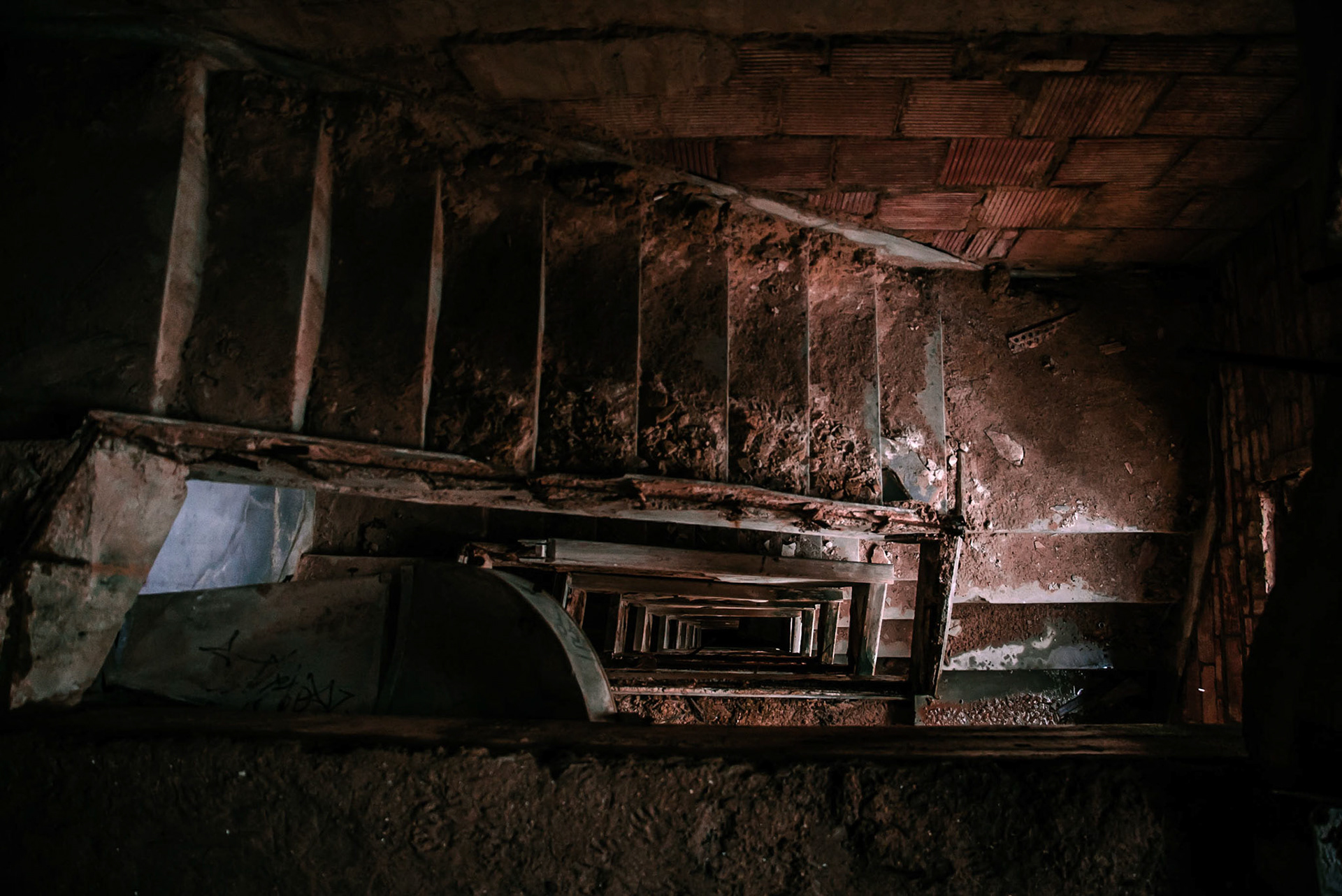 Photo of the previously derelict West end stairwell with no handrails of The Baker Hotel in Mineral Wells, Texas by Sam Casey