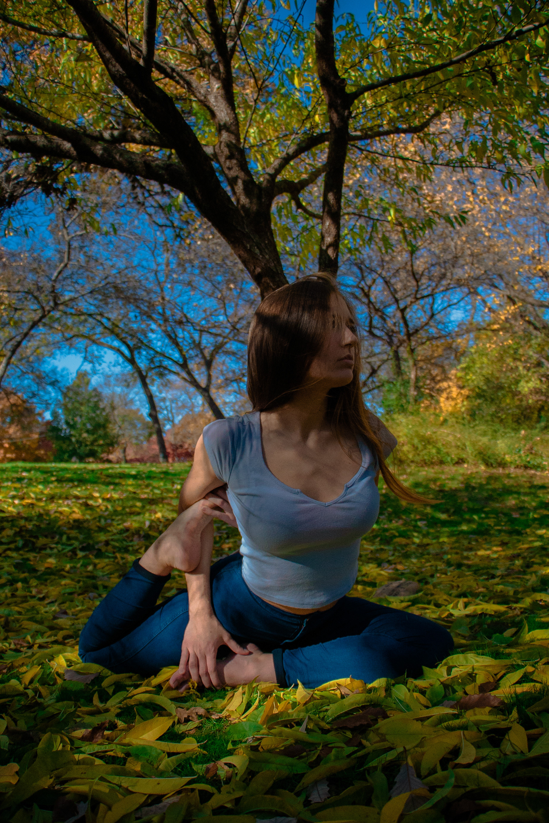 Photo of Jennifer Foster in a yoga pose at the Grapevine Botanical Gardens in Texas by Sam Casey