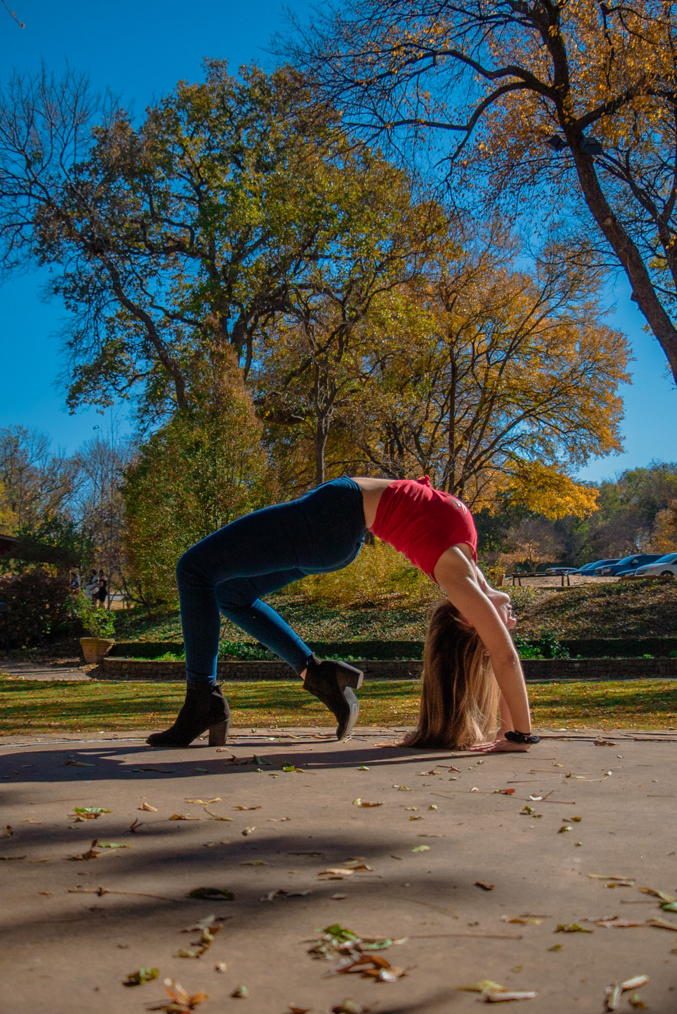 Photo of Jenny Foster doing a yoga pose in the Grapevine Botanical Gardens in Texas for advertisement photos by Carpe Noctem Films by Sam Casey
