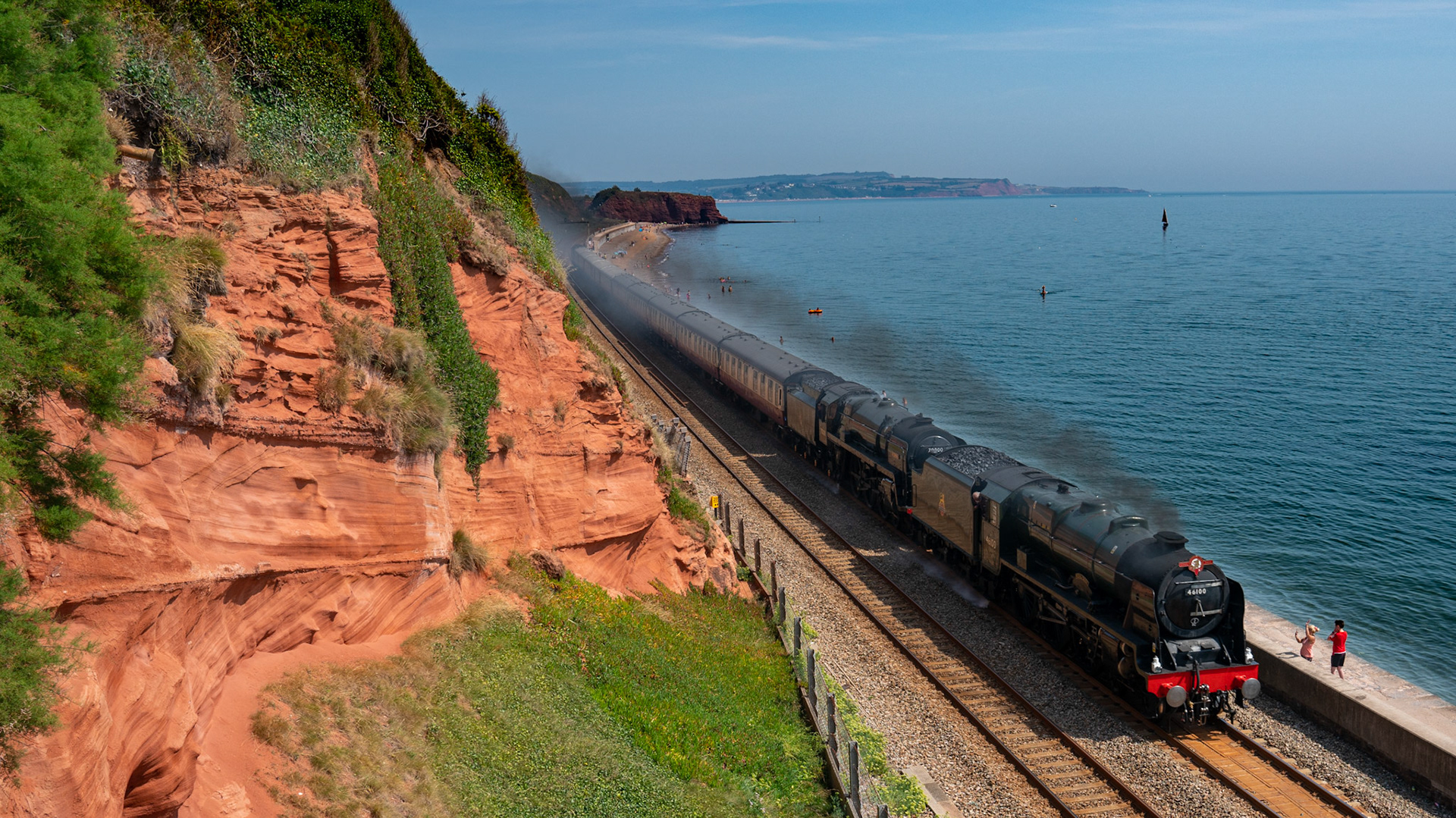 Double header of Royal Scot and Britannia approaching Dawlish