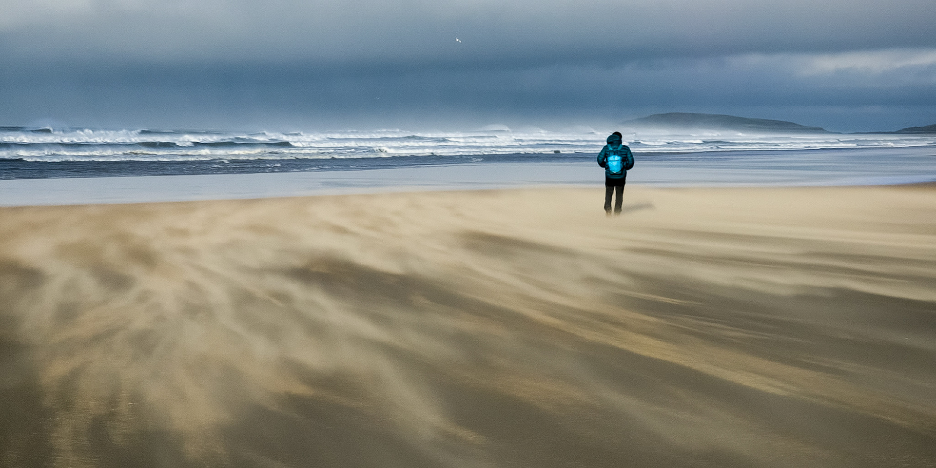 Rhossili Beach, 'dry ice' sand whipped by the wind