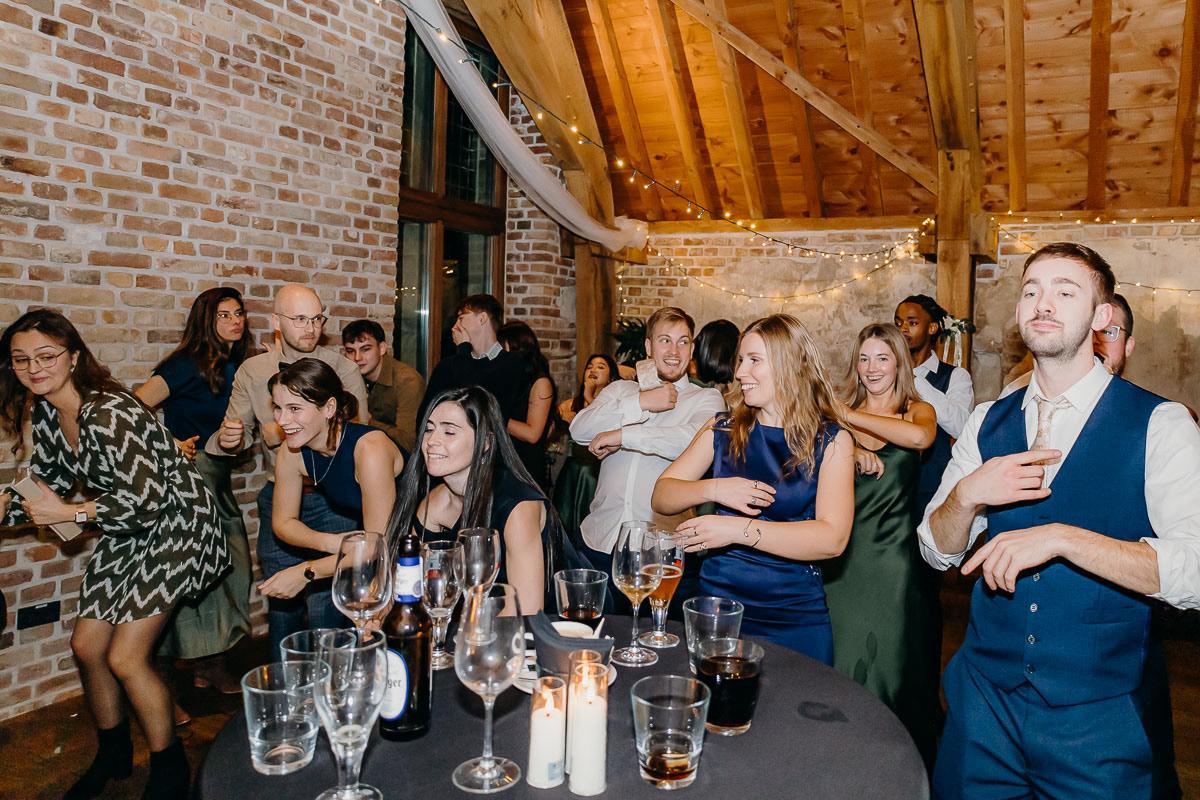 The wedding crowd having great fun on the dance floor in the Amsterdam wedding.