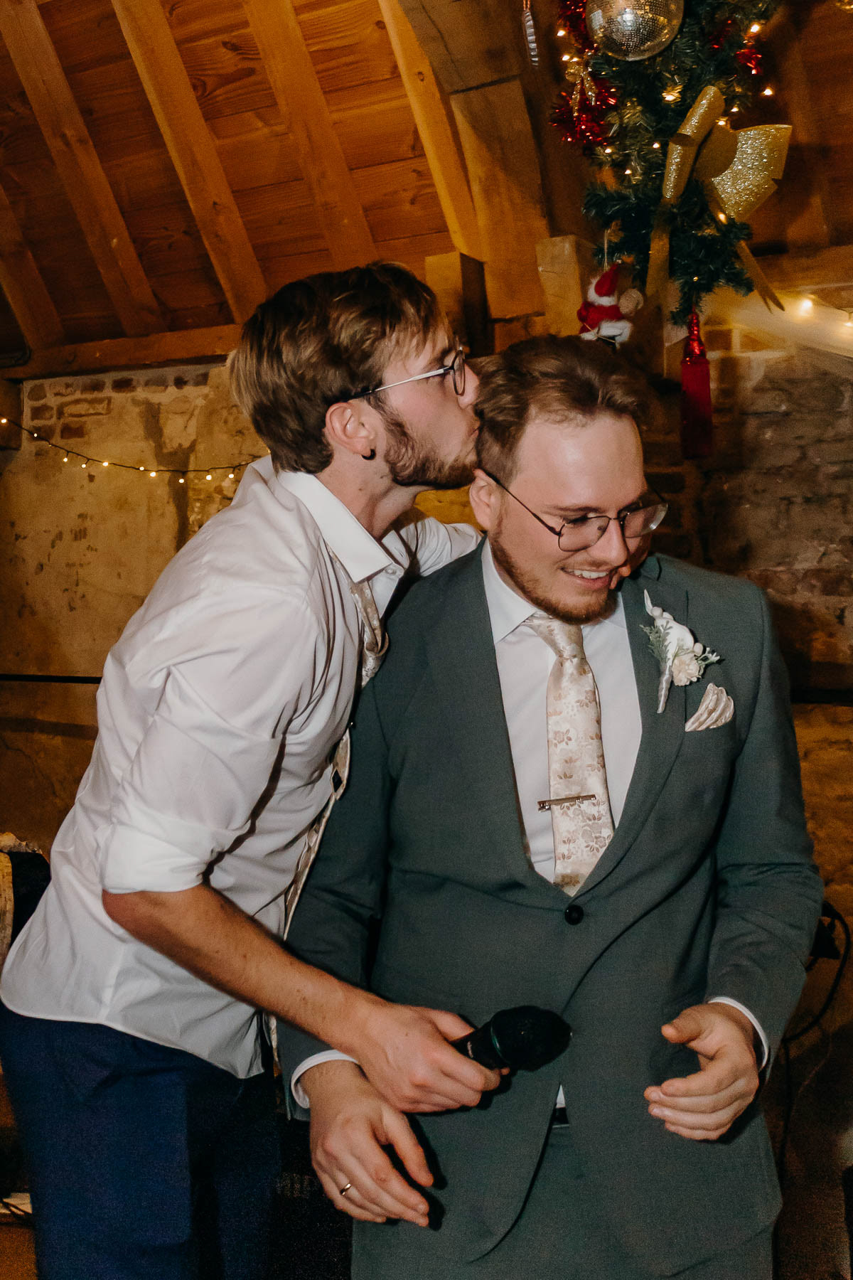 Brother showing his love for the groom during the wedding.