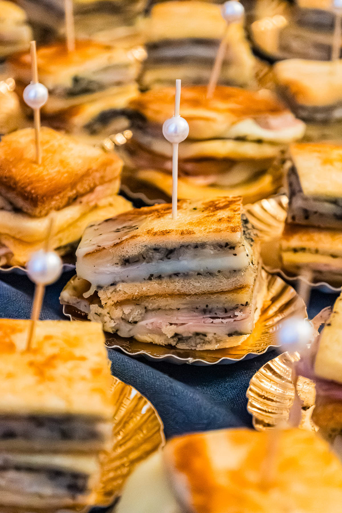 Beautiful layered sandwiches at the wedding, photographed by wedding photographer Rotterdam.