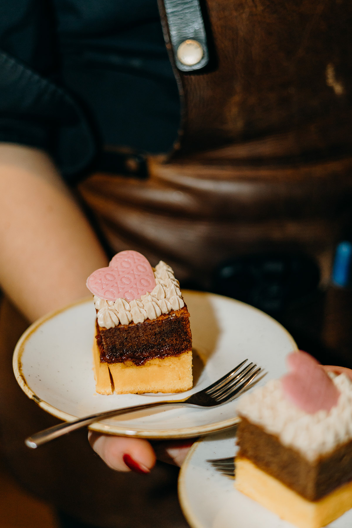 Wedding cake slices, taken by a wedding and food photographer based in Amsterdam.