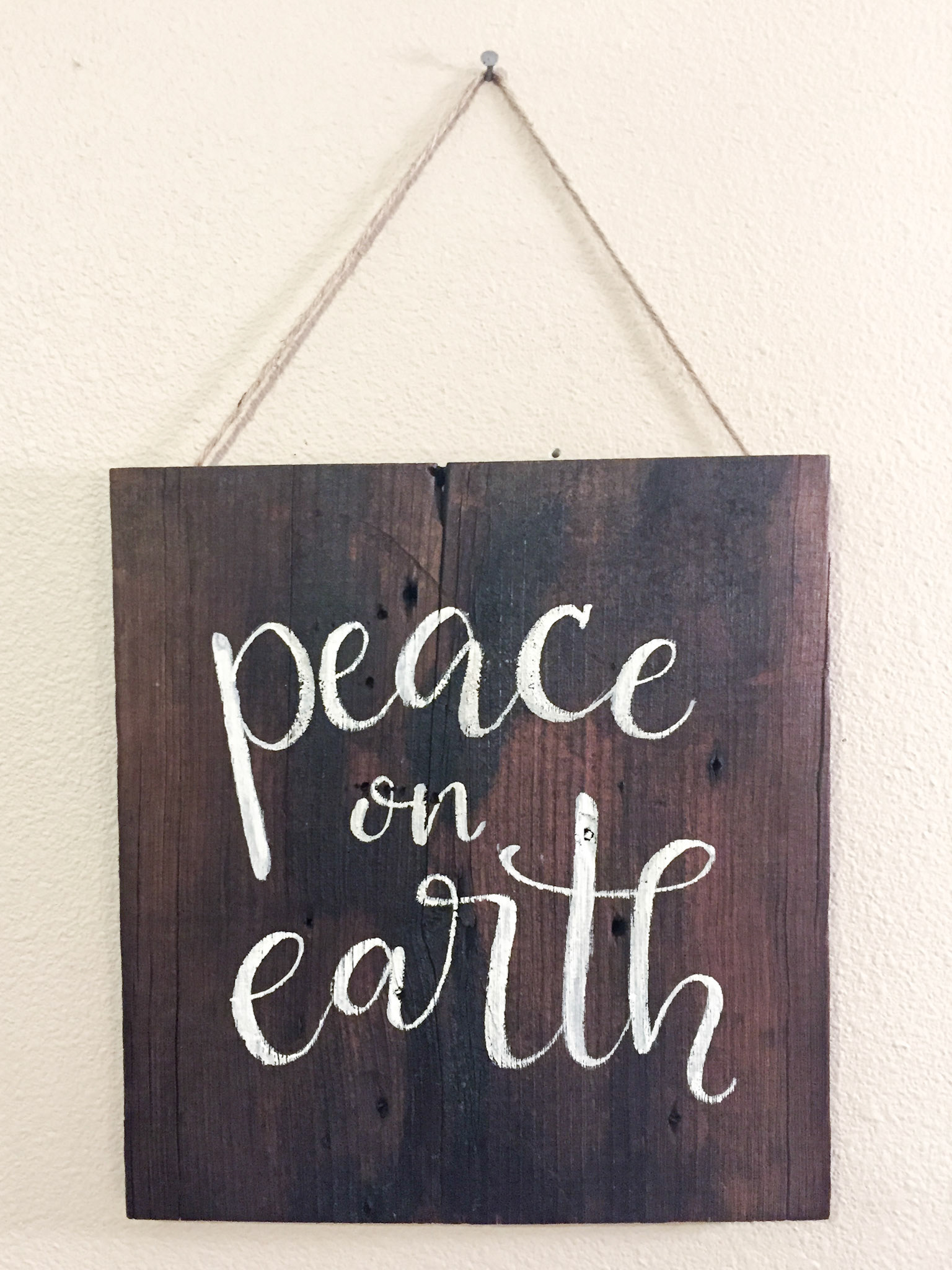 white acrylic on barn wood