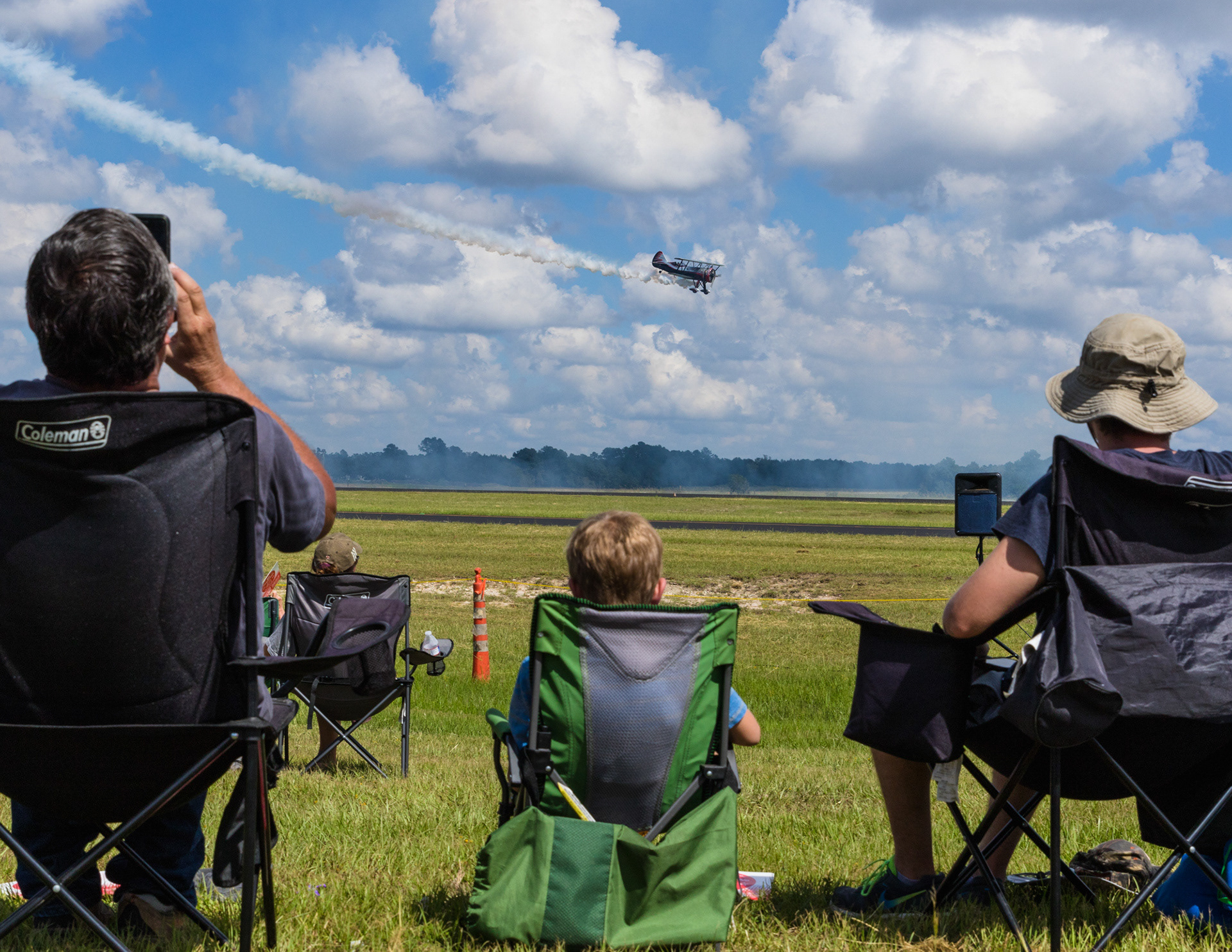 Kyle Franklin, flying his plane Dracula, paints the sky with contrails over a crowd during Angelina County Air Fest Saturday afternoon, October 6, 2018, at the Angelina County Airport in Lufkin, Texas. (Cara Campbell/The Lufkin Daily News)