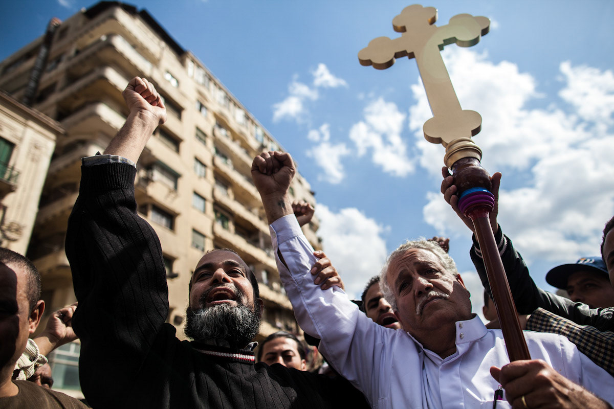 CAIRO--Muslims and Coptic Christians chant together following Friday prayers for both religious communities as protests continue against remaining elements of Hosni Mubarak's authoritarian regime still clinging to power.
