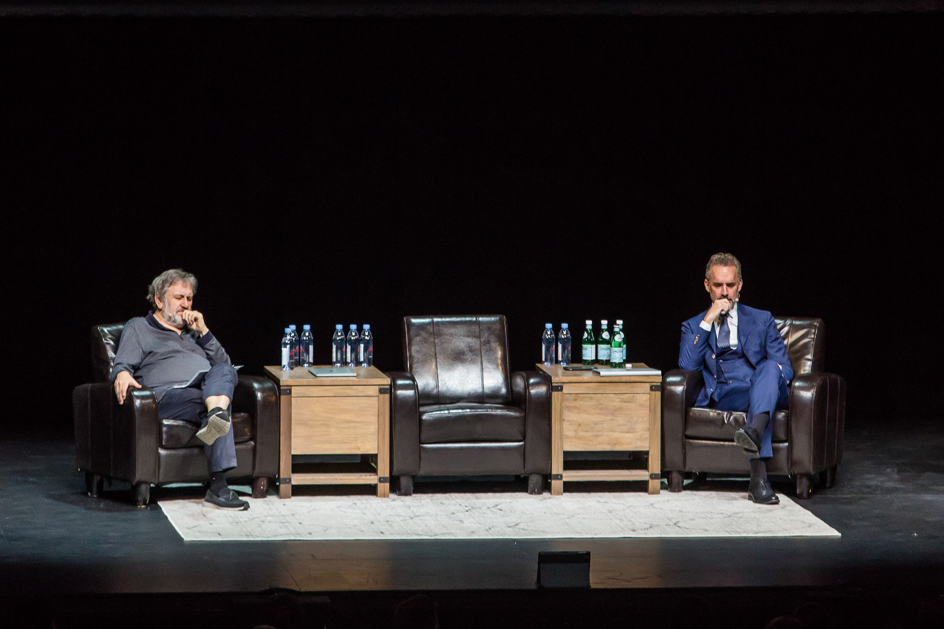 TORONTO--April 19, 2019 - Slovenian philosopher Slavoj Zizek and Canadian psychologist Jordan Peterson are seen during a pensive moment in their debate.