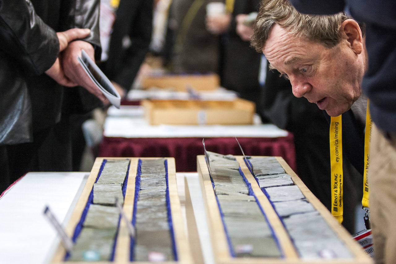 TORONTO, Ont. : (5 March 2013) - A delegate looks at core samples at an exhibitor booth at the Prospector's &amp; Developers Association of Canada Convention. Thousands of participants filled the halls of the Metro Toronto Convention Centre, hailing from across Canada, the continent and the globe. Photo by Giordano Ciampini for iPolitics