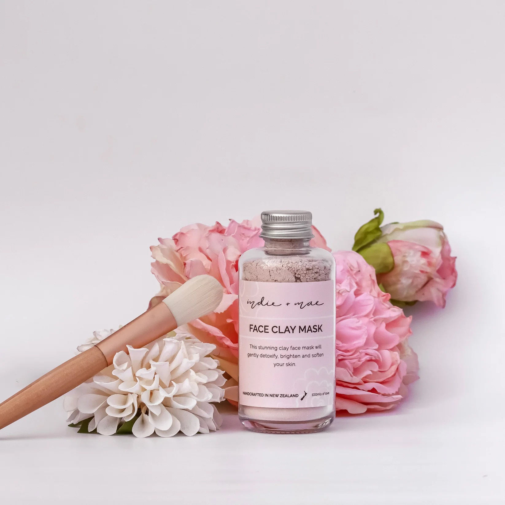 Indie + Mae peachy pink natural beauty packaging designed by Laura Fisher.