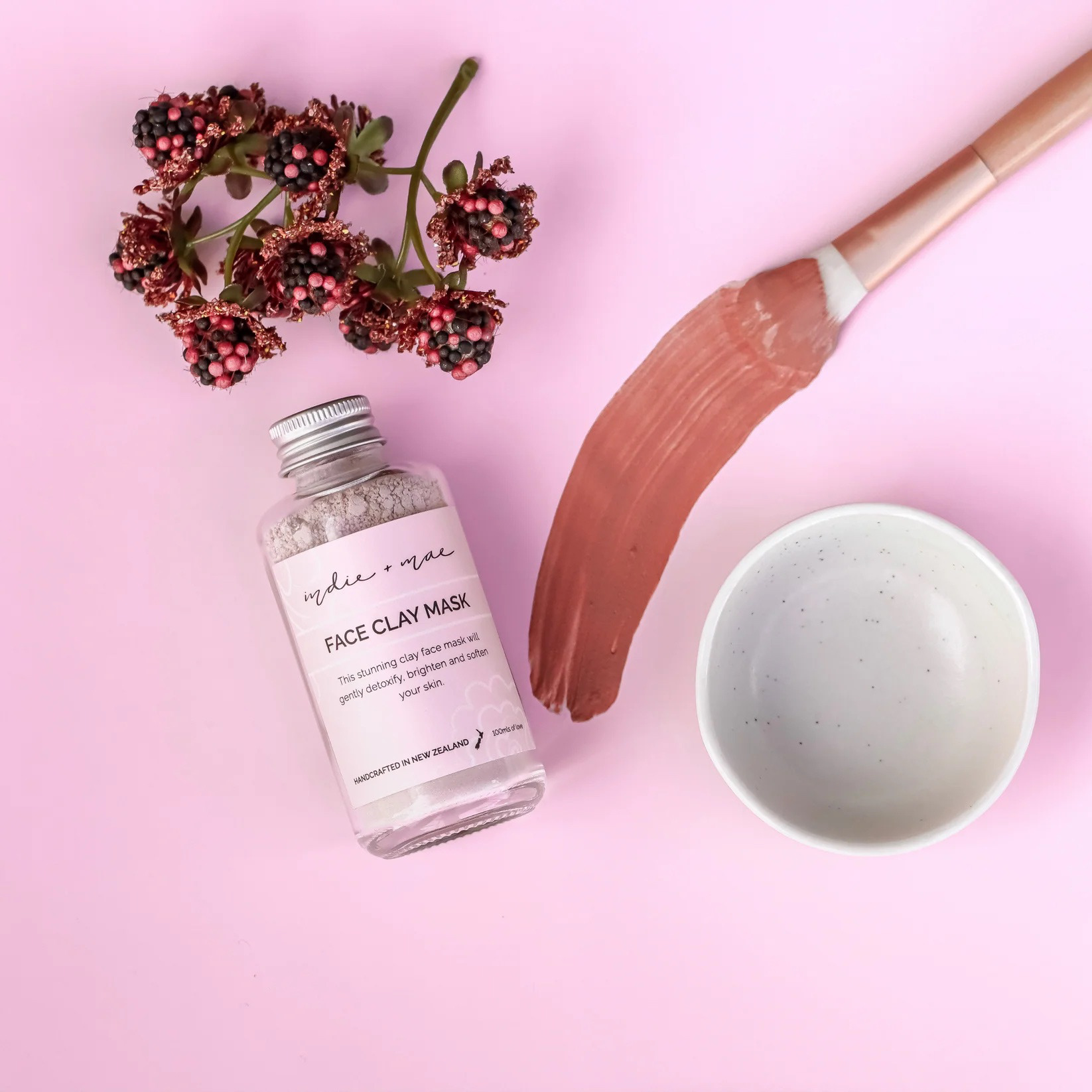 Indie + Mae peachy pink natural beauty packaging designed by Laura Fisher.