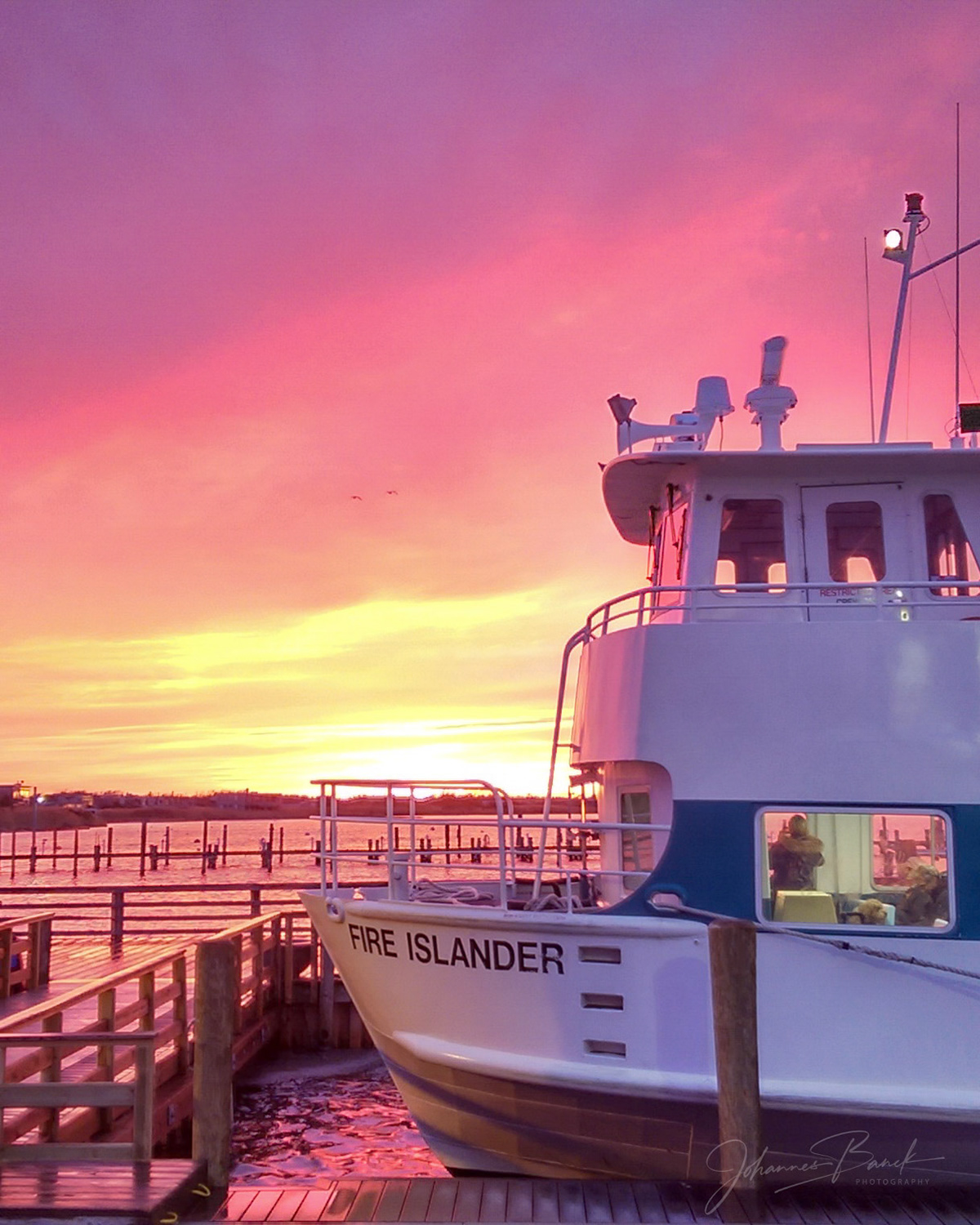 The Fire Islander Ferry docking at Fair Harbor Harbor on Fire Island. The 30 minute trip is THE gateway to sun, sand, surf, and most of all fun! Servicing the 7 western towns of Fire Island,
