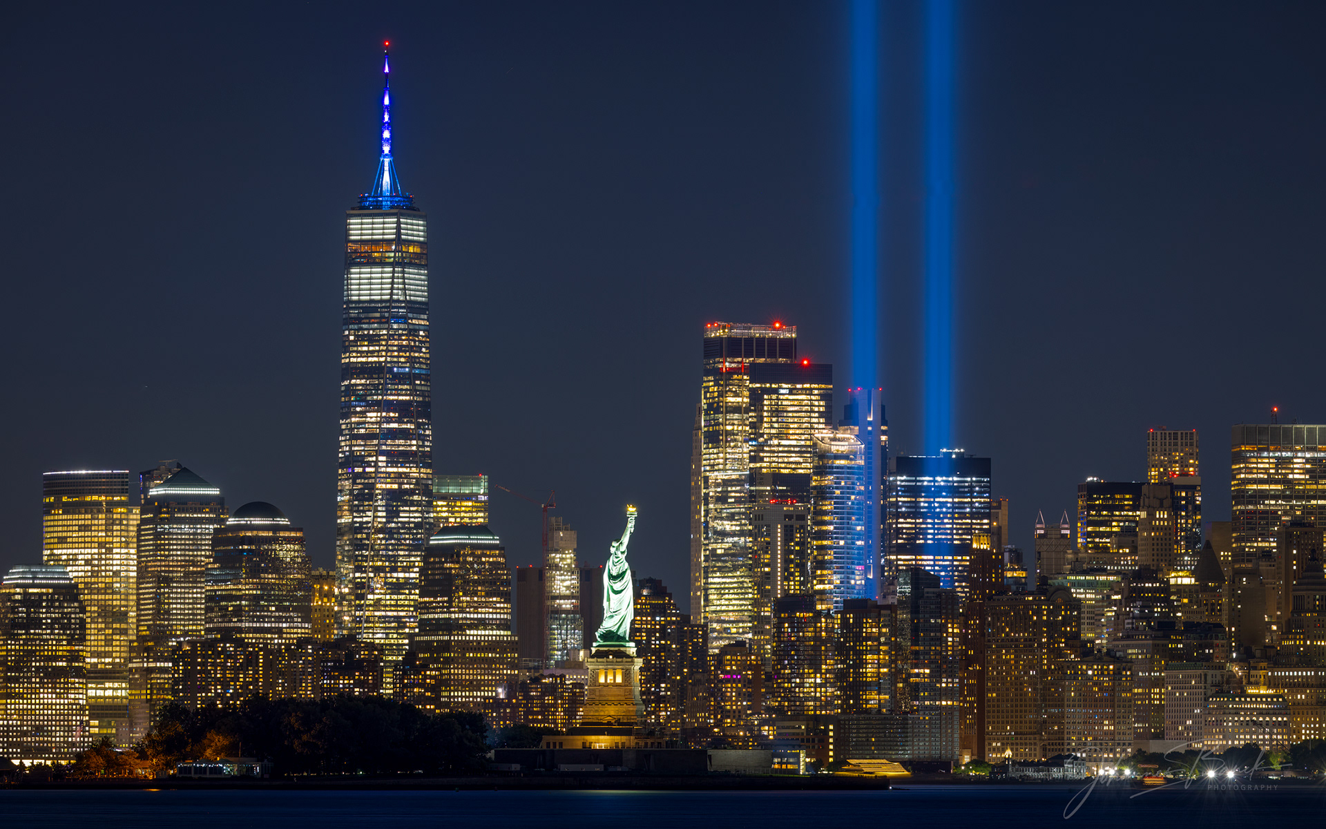 The 9/11 Memorial Light Installation, known as the Tribute in Light, is a poignant and powerful art installation that honors the victims of the September 11 attacks. Each year on the anniversary, from dusk to dawn, two beams of light rise into the sky from Lower Manhattan, symbolizing the Twin Towers. This installation not only commemorates those who lost their lives but also celebrates the enduring spirit of the city and its people.