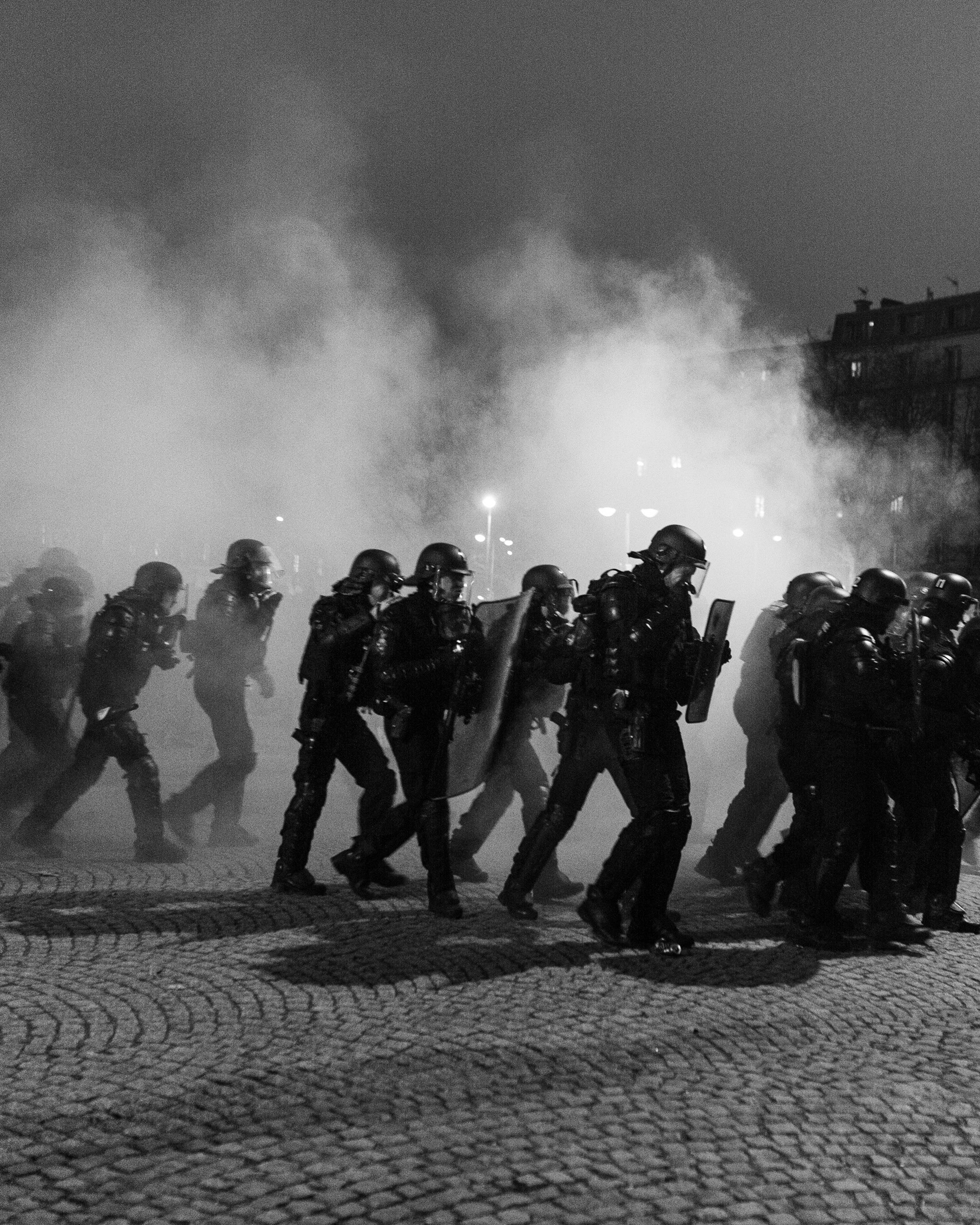 31.01.2023 Paris A police squad tries to regroup during the clashes between demonstrators and the police in Paris. A French pension reform strike took place for the second time this month where hundreds of thousands took the streets in Paris to pressure President Emmanuel Macron to drop the pension reform plan.