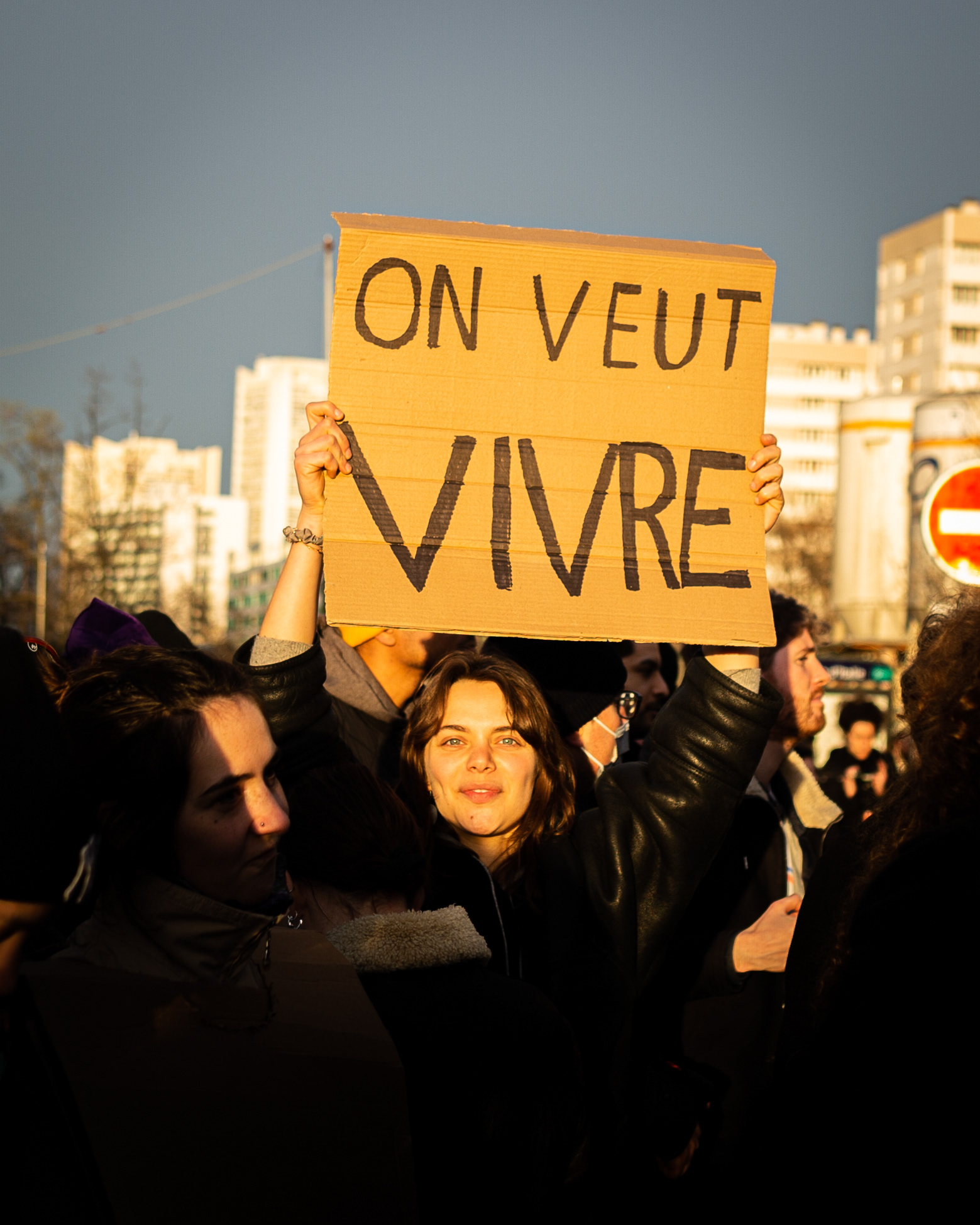 A protester holds a placard during the demonstration. Thousands of French people gather and march on the streets of Paris on March 15, which marks the eighth general strike against the new Macron's pension reform.